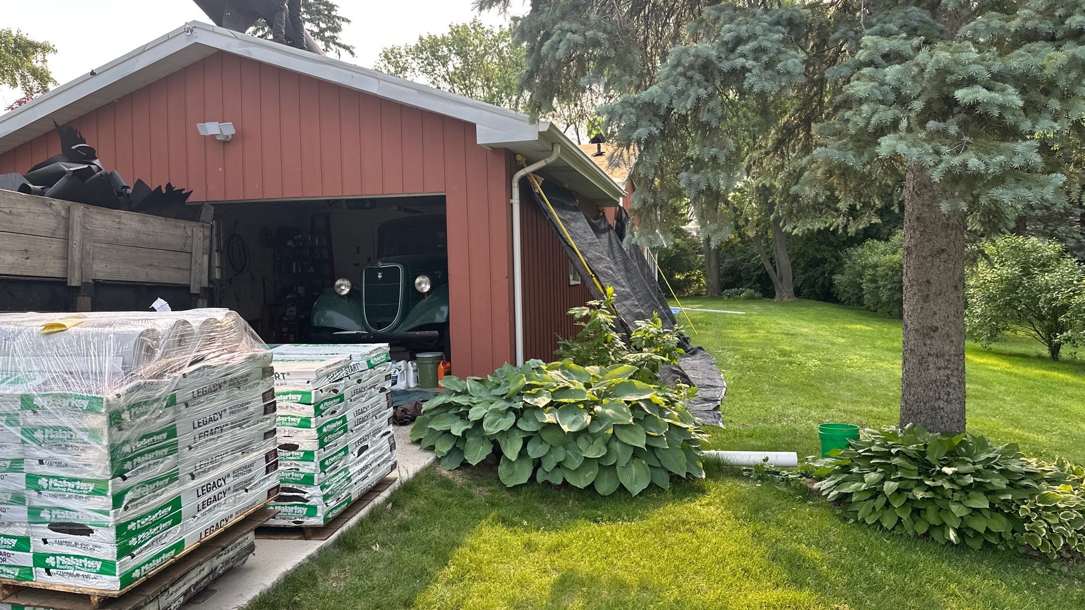 Roof replacement Malarkey Legacy shingles color Sienna Blend by Pro Home Services Inc