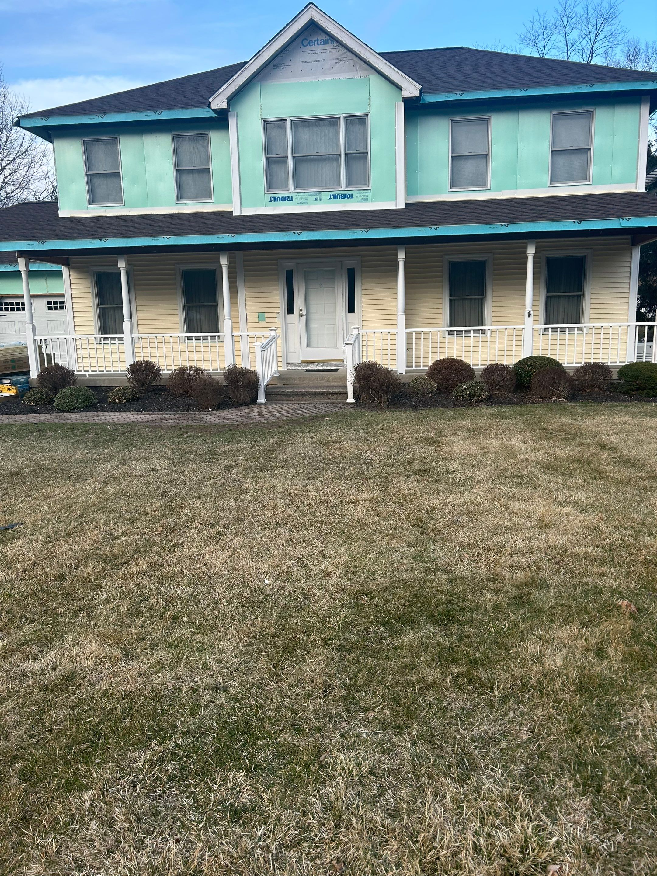 Siding using Cert. Monogram D/4 x 12'6" Clapboard, Heritage Cream by DiGiorgi Roofing and Siding Inc