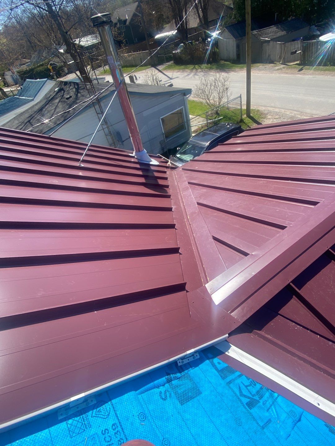 Residential Roofing Installation using 16" Standing Seam Panels by Jay Carter Roofing & Sheet Metal