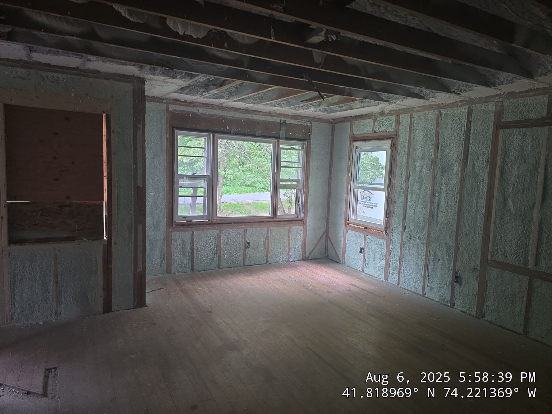 Master bedroom Exterior Walls using open cell spray foam by NYS Foam & Energy