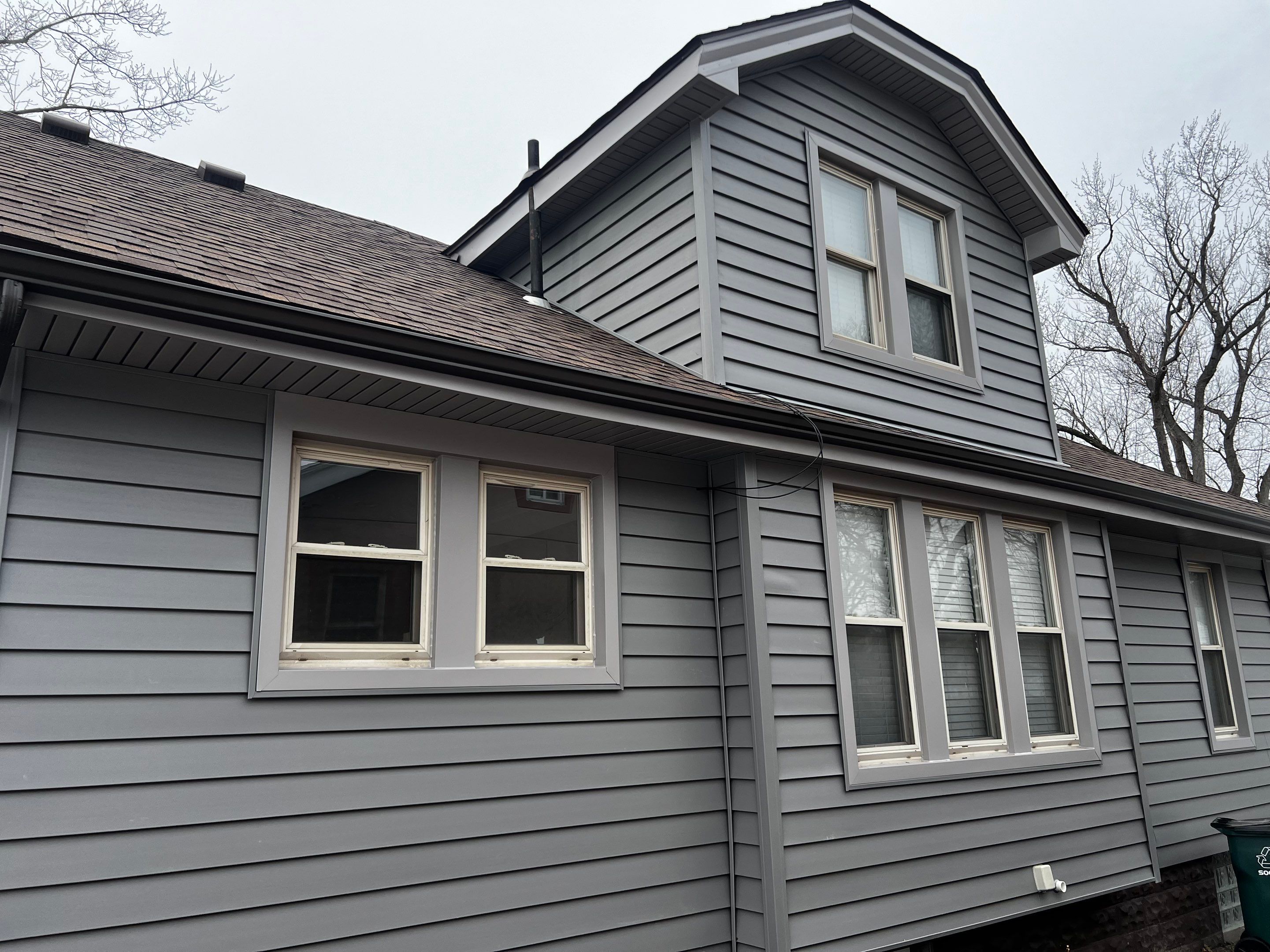 Vinyl Siding Replacement by Bloomfield Construction & Restoration