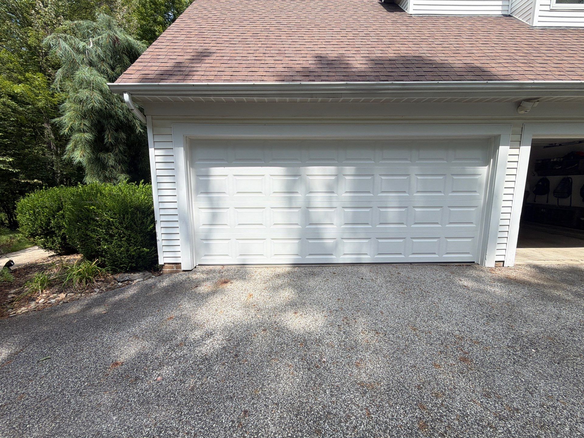 White Raised Panel Sectional Garage Door Installation in Solon by Ohio Garage Door Repair