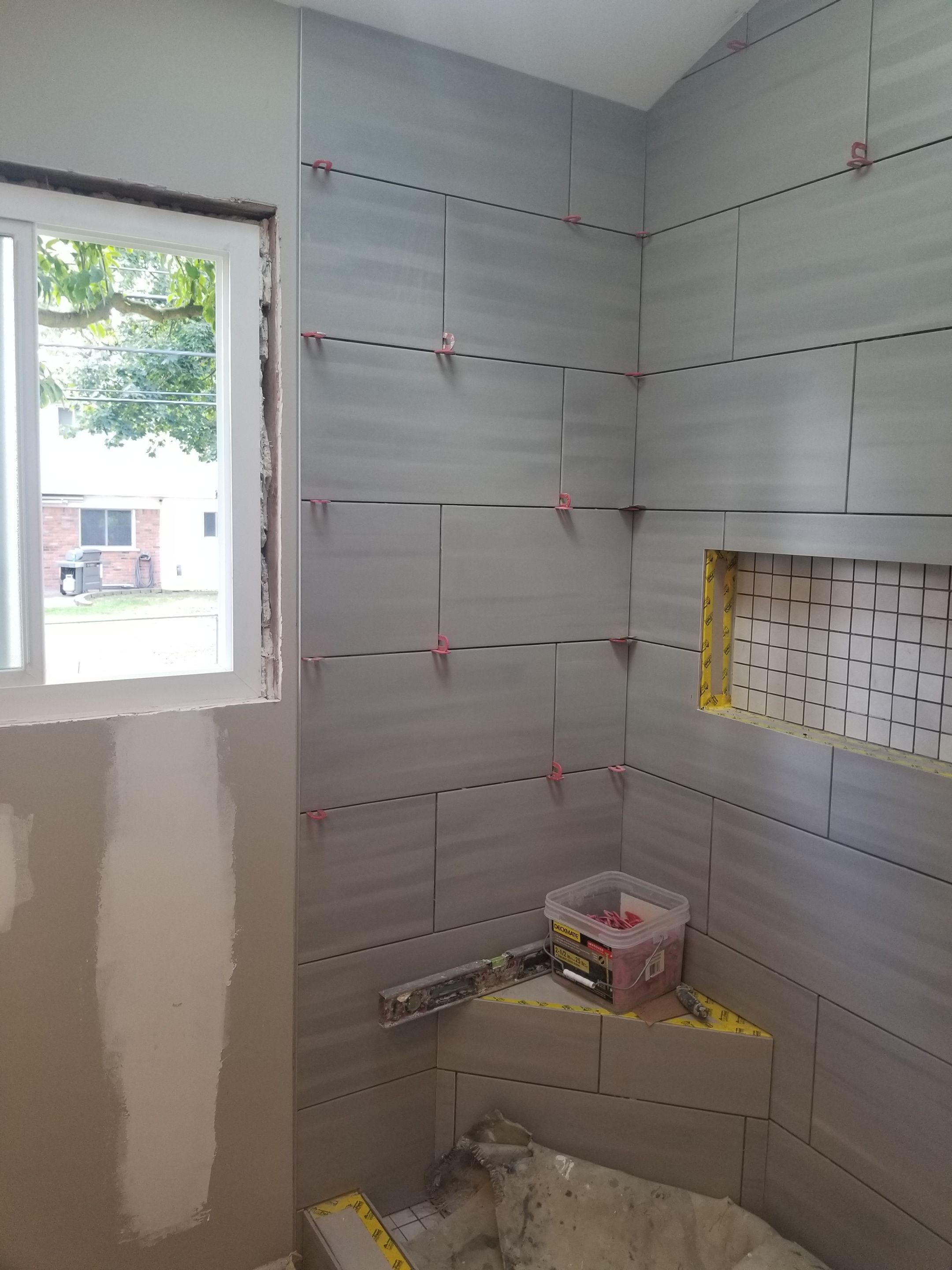 Remodel full bathroom new tile walk in shower plus 2nd half bath Powder room in Livonia, MI by Northwest Construction