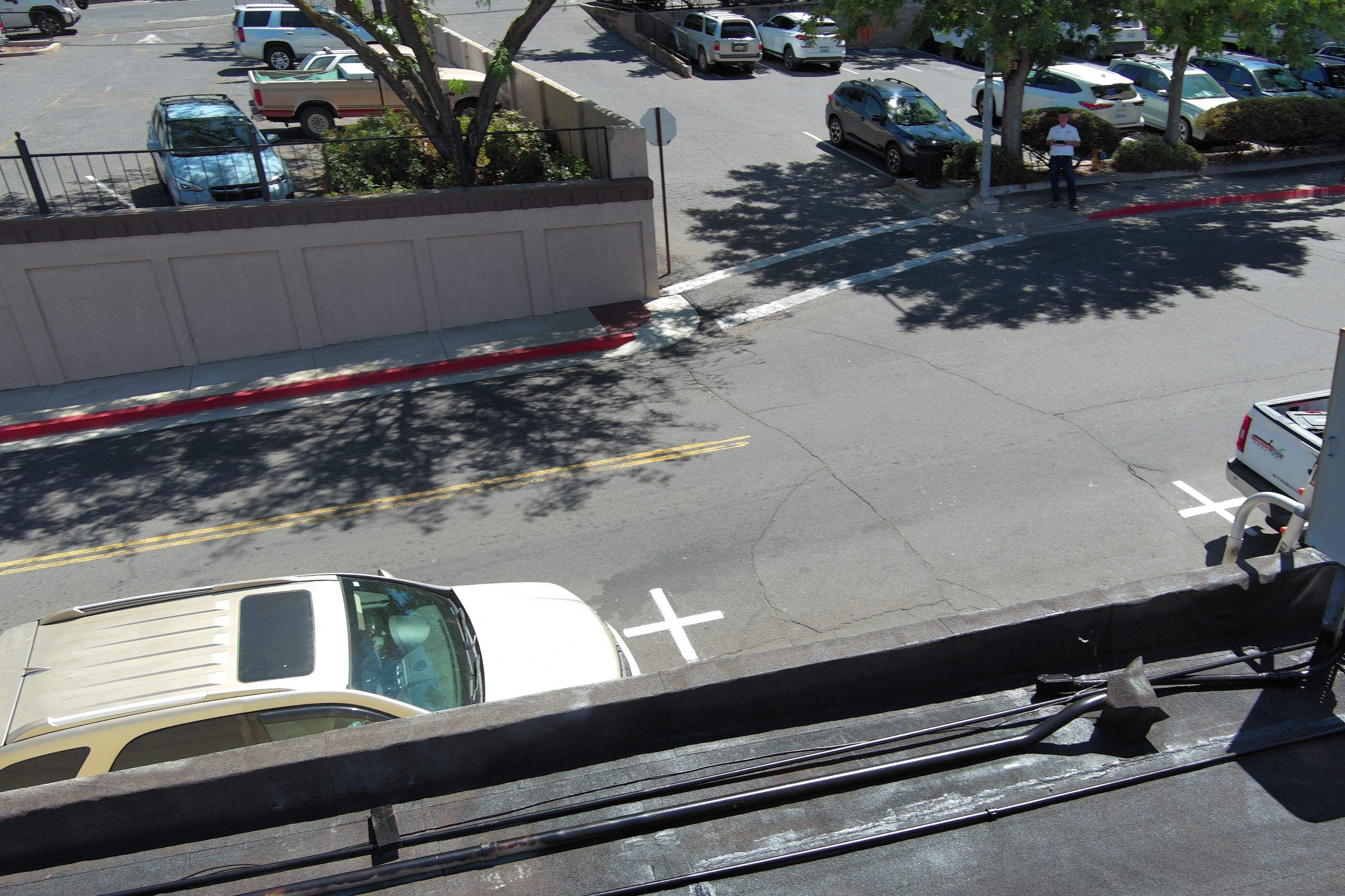 Foam and coatings on commercial roof by Straight Edge Roofing Inc