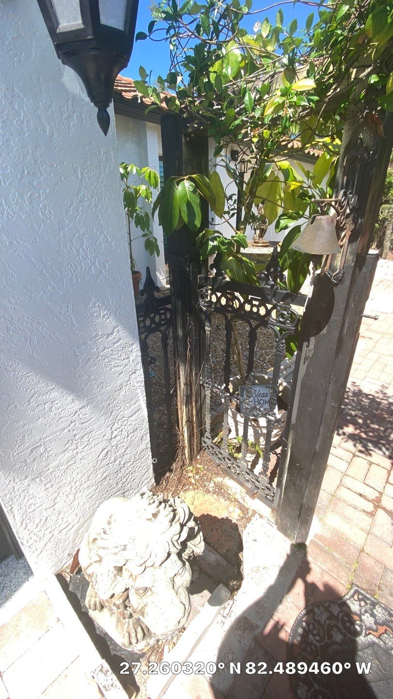 Sarasota, FL 6ft. Tall Horizontal Shadowbox Wood with 4ft. Tall 3-Rail Black Aluminum Fence by Asap fence and gates, LLC