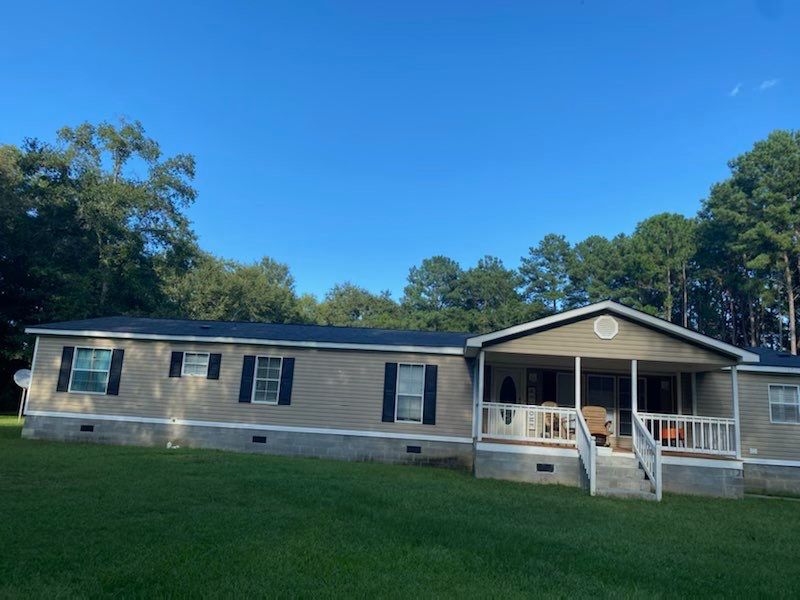 Roof replacement in progress on a Vienna, GA home