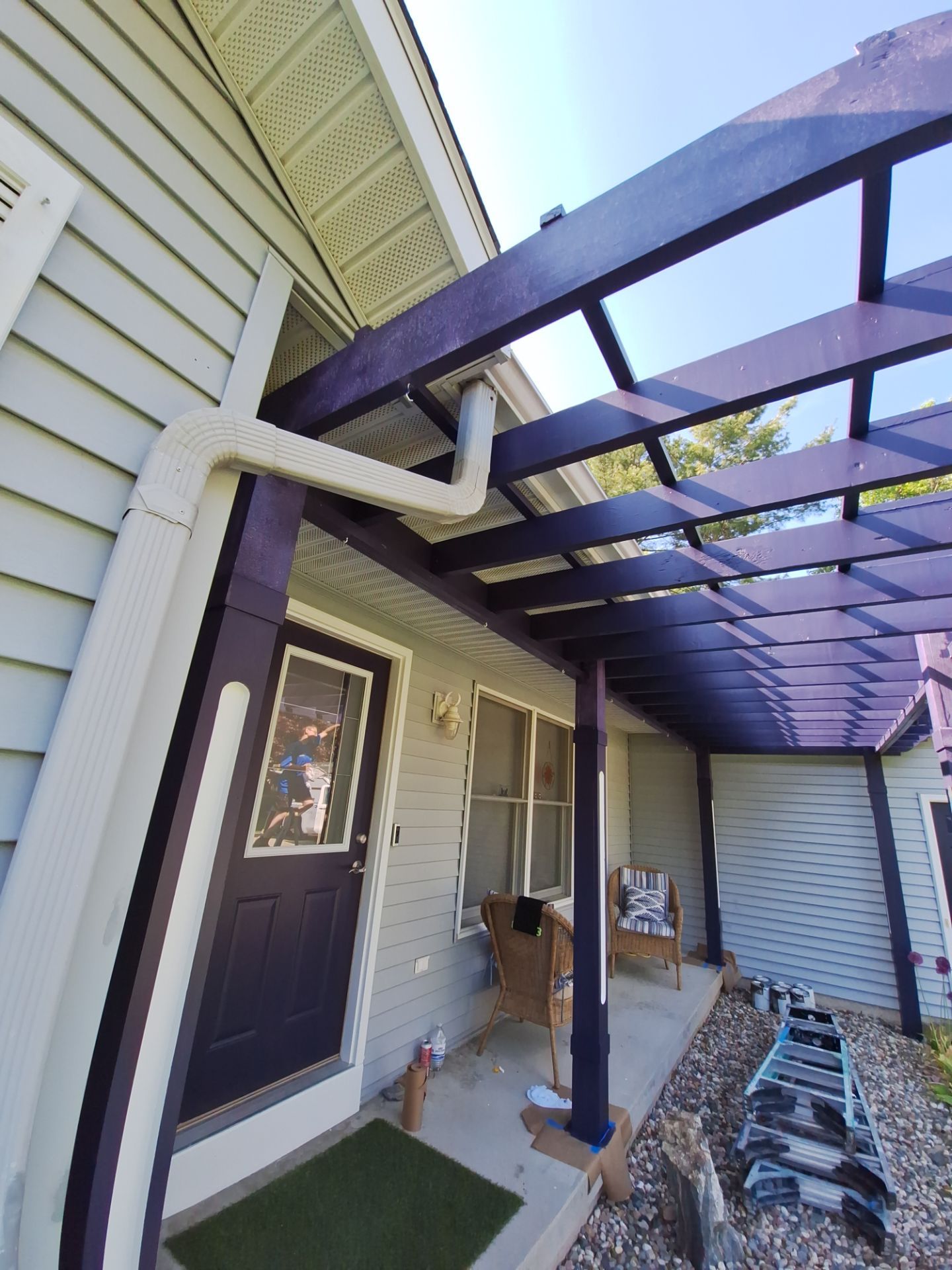 Repaint bedroom furniture, Pergola, and doors. Stain decking by Gordon Painting