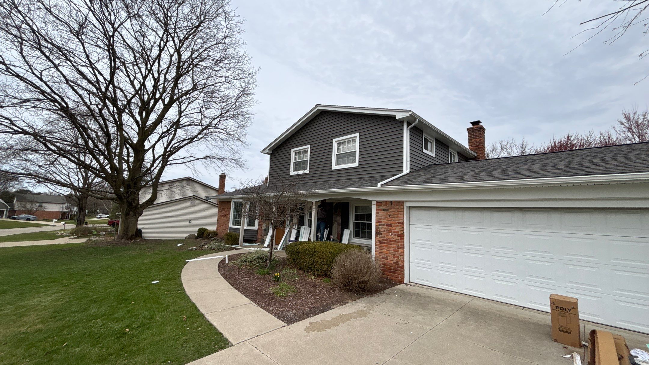 Siding Replacement using Alside Charcoal Smoke and Roof Replacement using Owens Corning Peppercorn by 180 Contractors