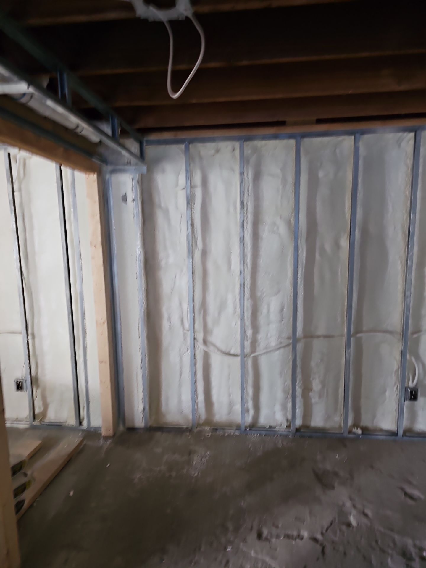 Basement Exterior Walls using Closed Cell Spray Foam by NYS Foam & Energy