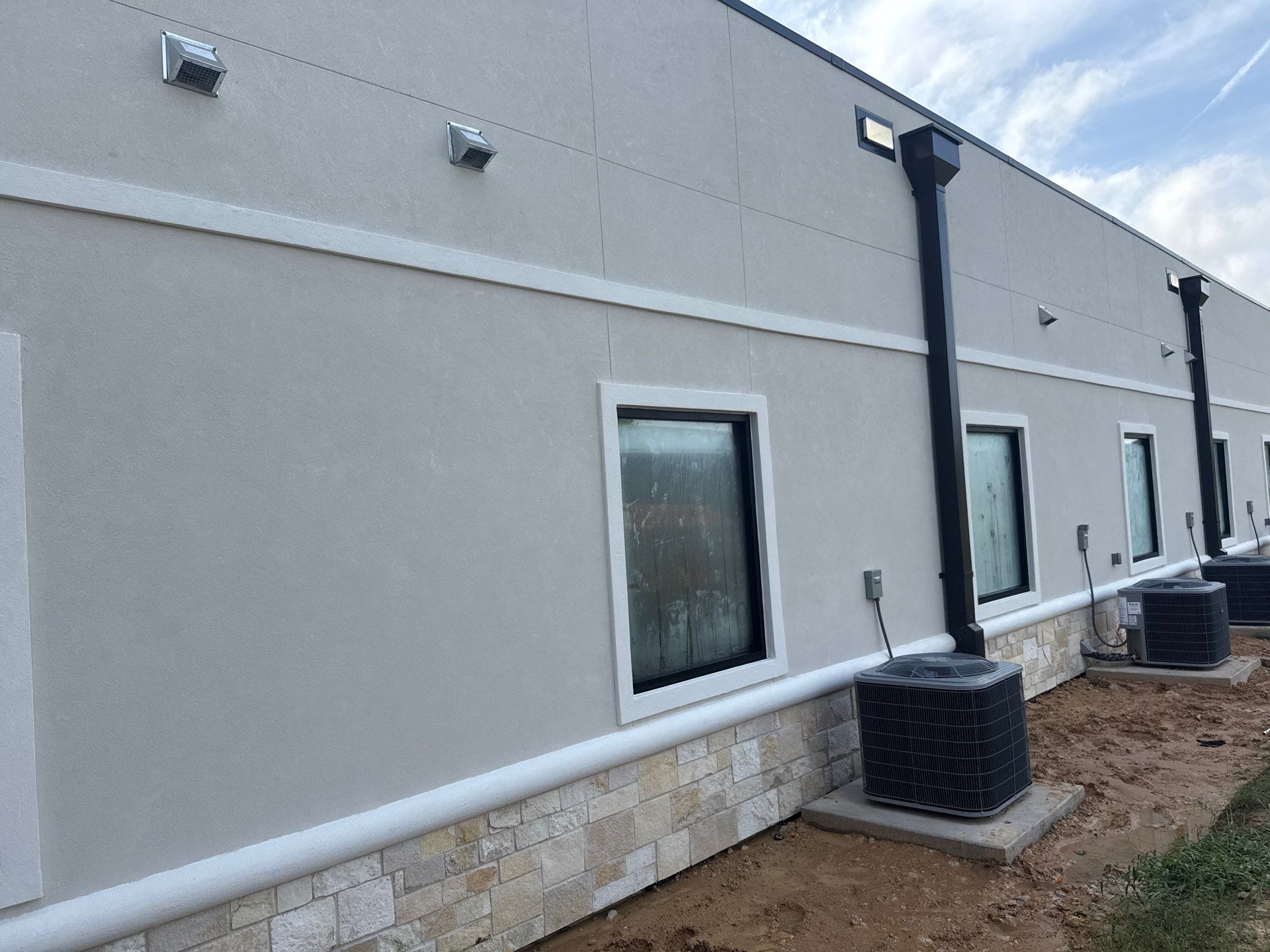 Commercial Façade Excellence with Bullnose Detailing by Apex Conventional Stucco Llc