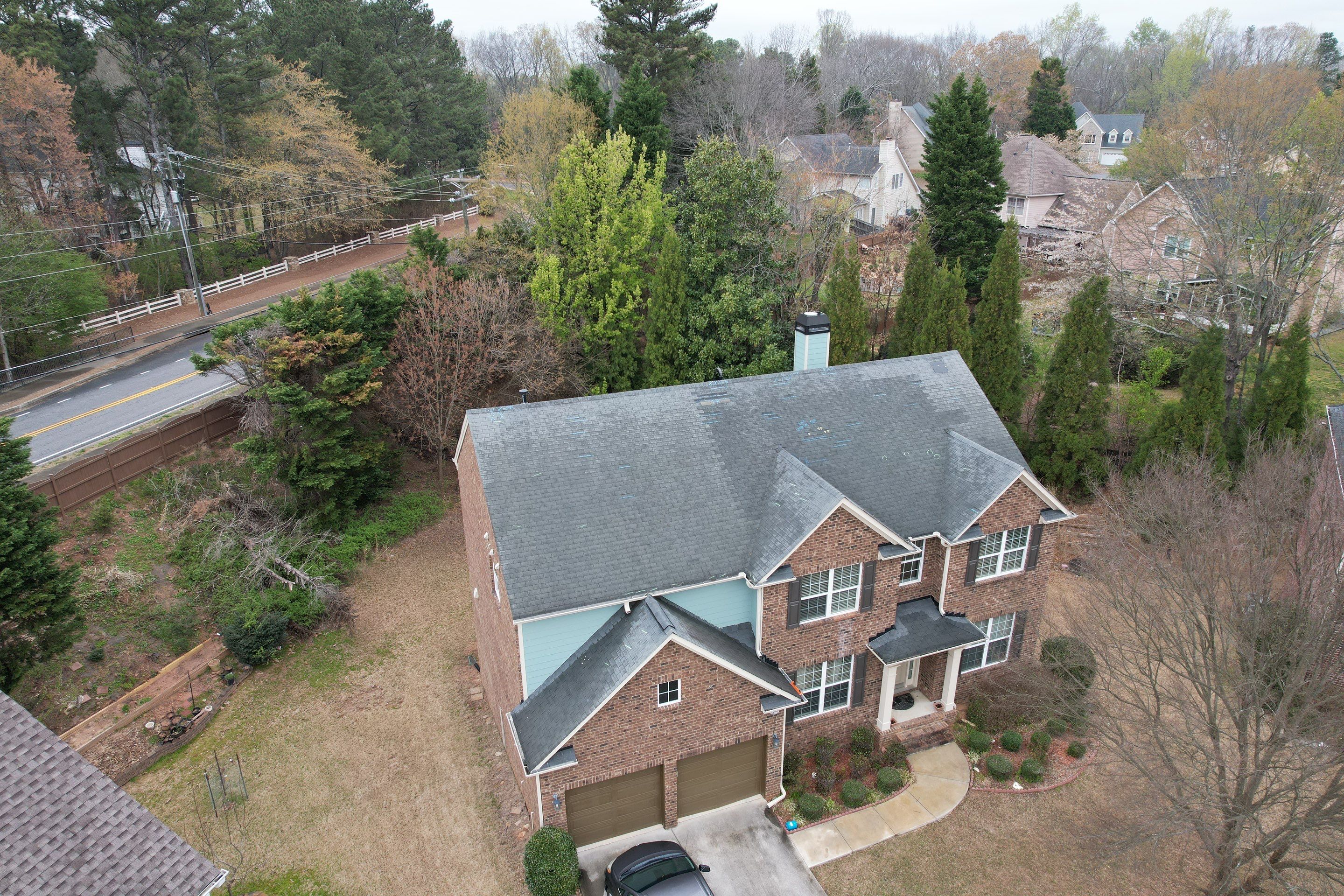 Residential Roofing Installation using Owens Corning Onyx Black by Inspector Roofing and Restoration