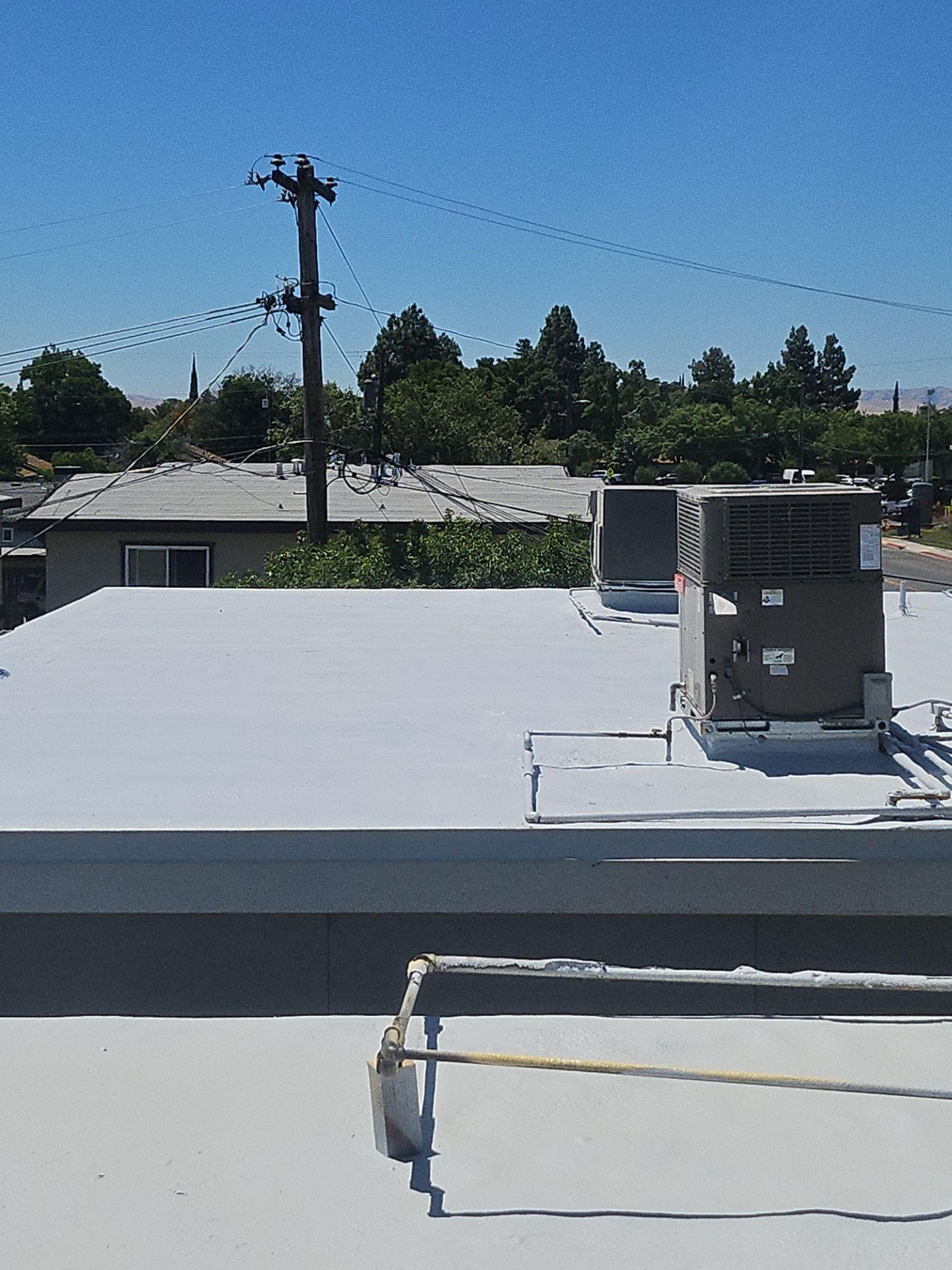 Foam Refurbish using General Coatings acrylic coatings and spray foam by Straight Edge Roofing Inc