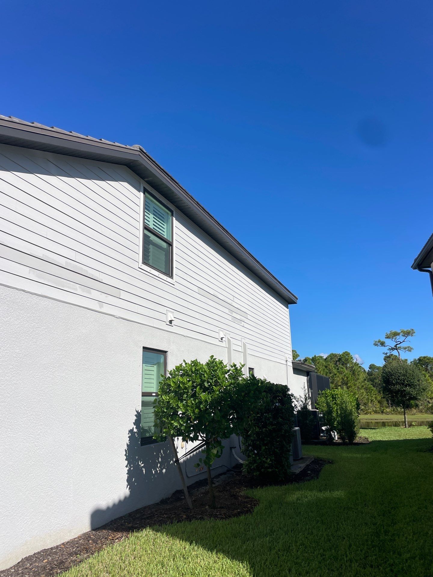 Black Seamless Gutters in Fort Myers FL by Gutter Professors