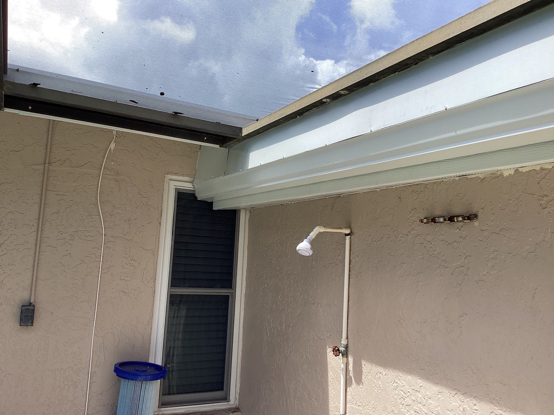 White Seamless Gutters and Splash Guards in Fort Myers FL by Gutter Professor by Gutter Professors