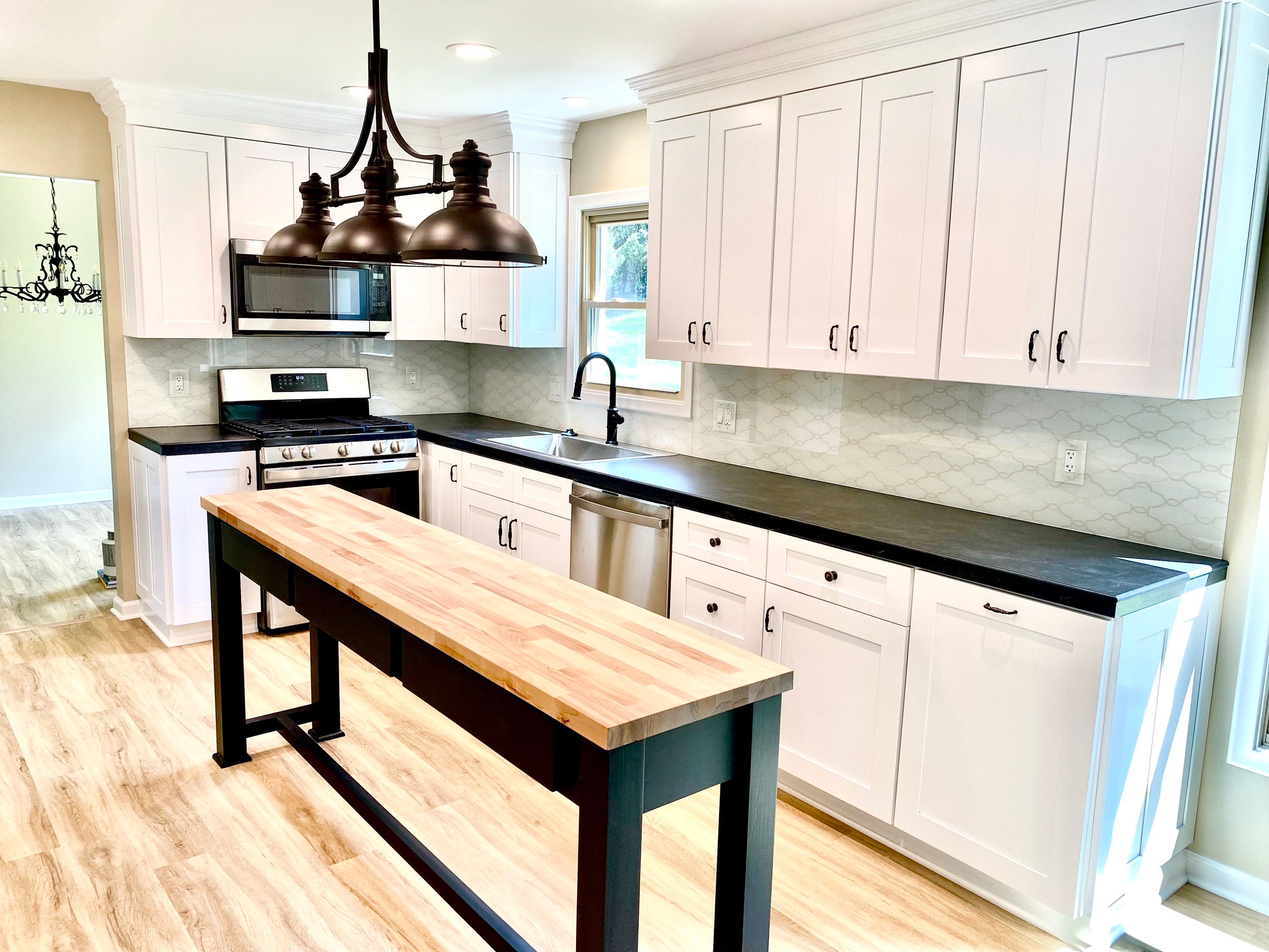 Kitchen Remodel using IMAGIO Arabesque Drops Solid Glass Backsplash by IMAGIO