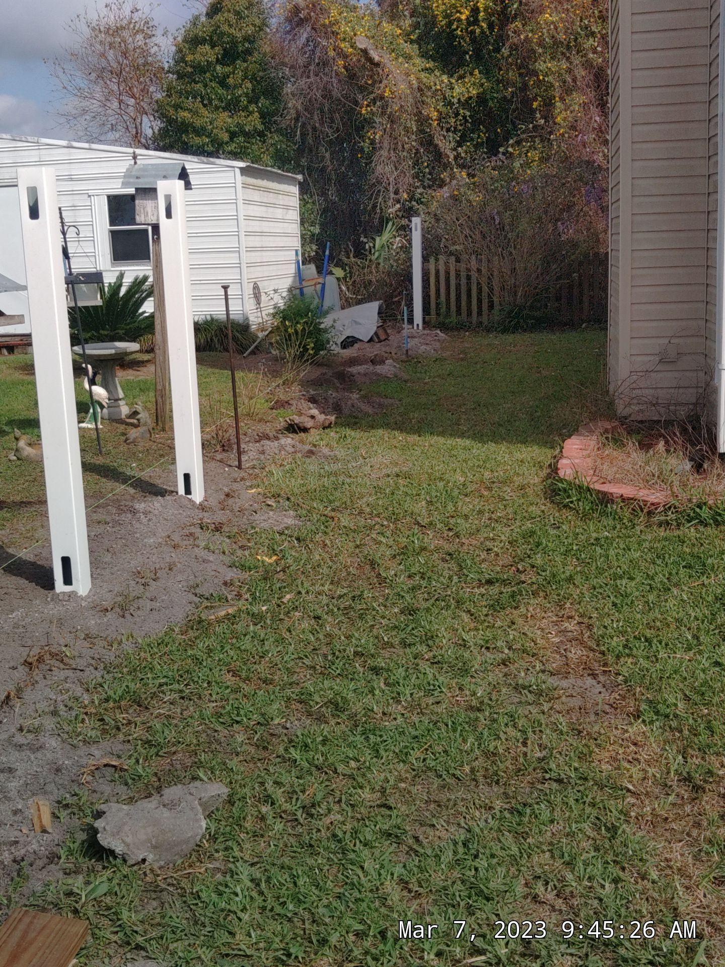 Fence Installation using White Vinyl by Hip Square Fence Inc.