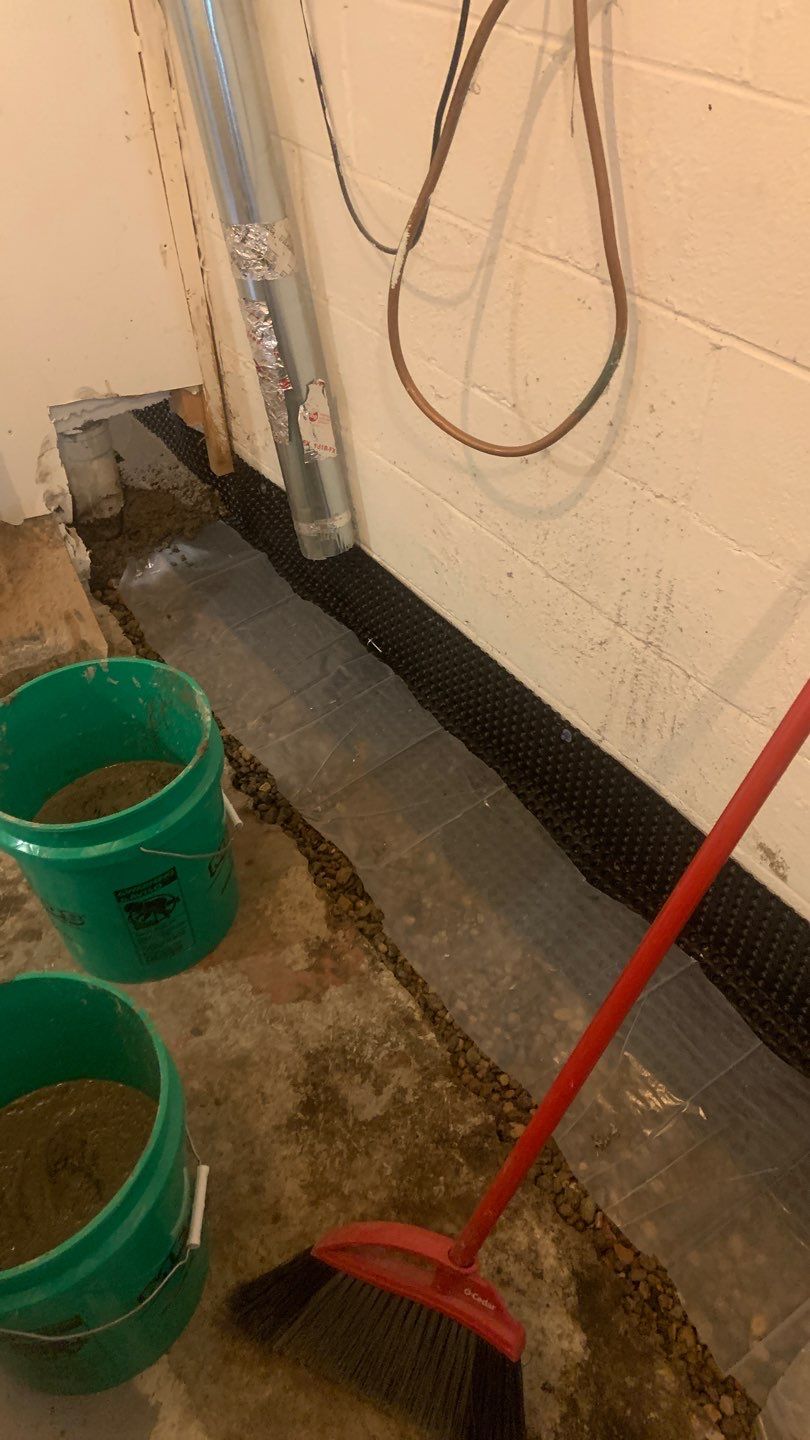 Solving a One-Wall Water Issue in St. Paul by Waterproofing Northeast