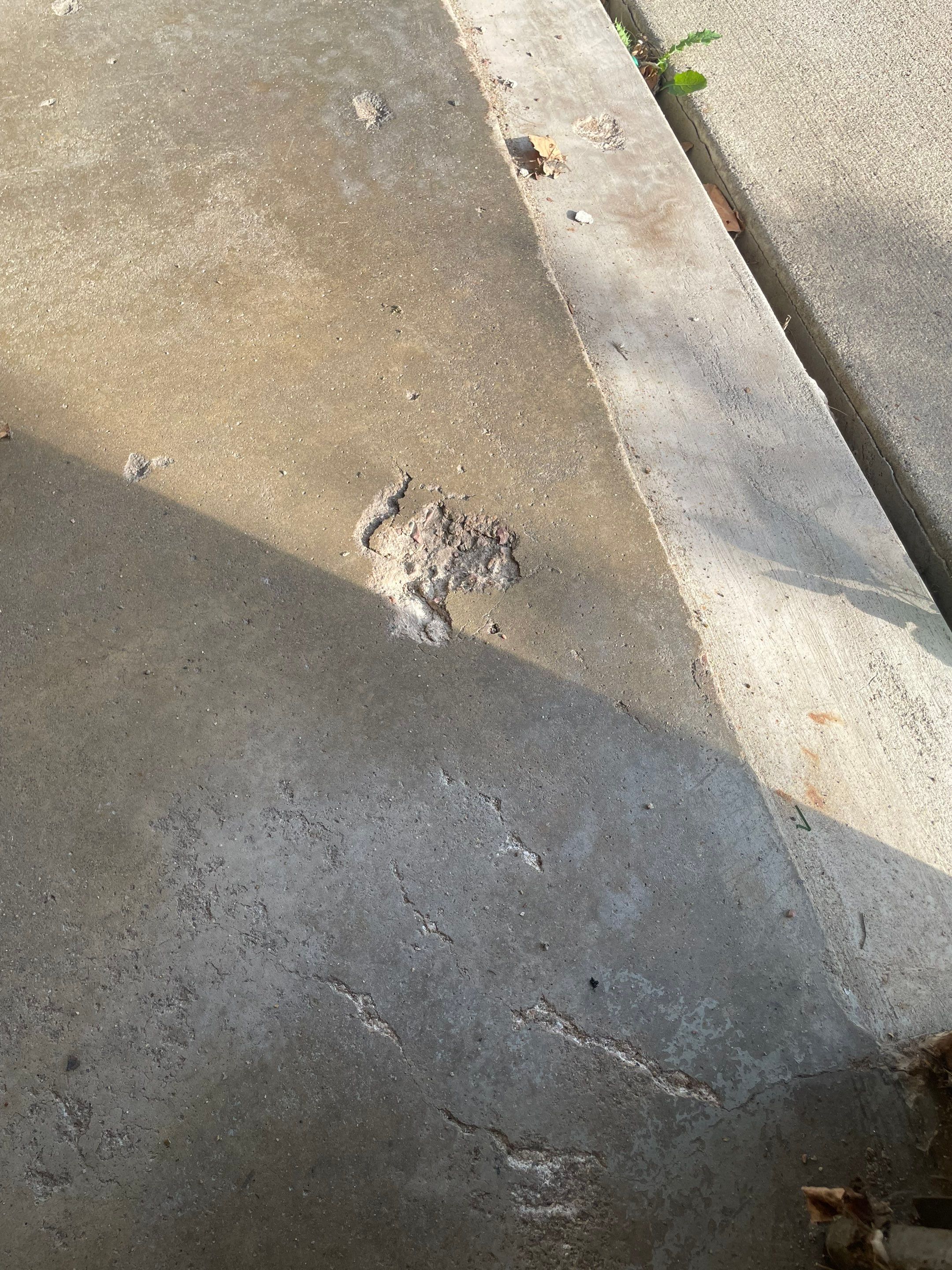 Custom Creekbed Garage Floor Coating in Sioux Falls by Select Painting, Coatings & Garage Cabinets