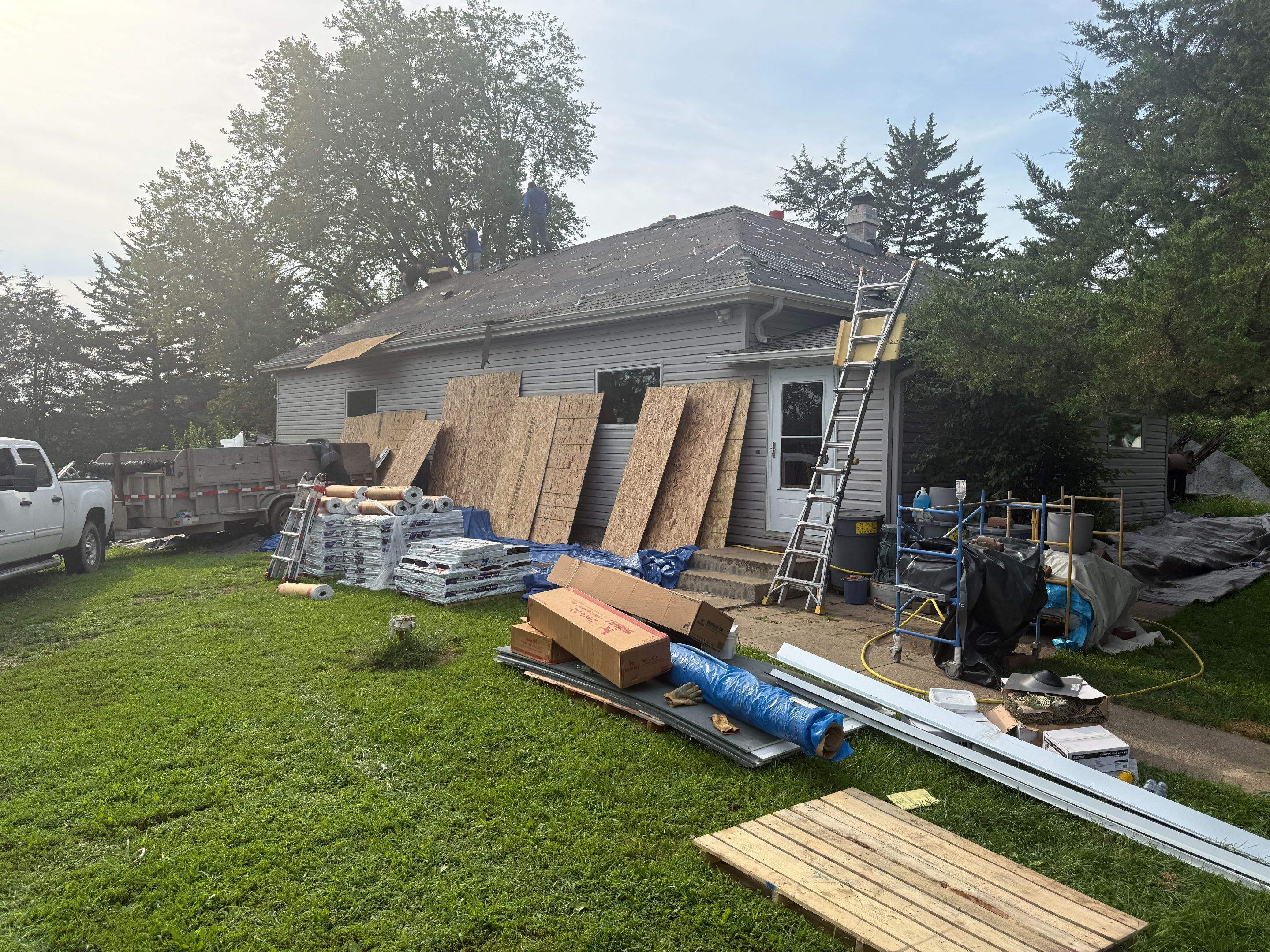 Asphalt Shingle and EPDM Membrane Roof Installation in Mineola by Star Home