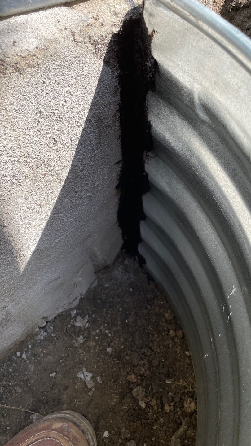 Drain Tile, Window Wells & Buried Discharge in Minneapolis by Waterproofing Northeast