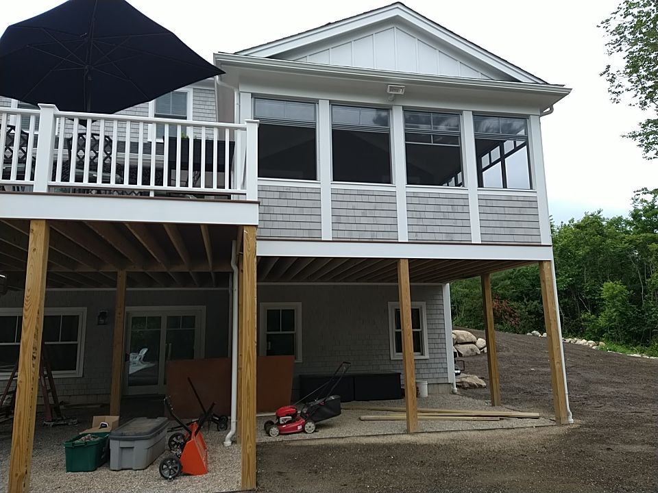K-Style Gutter Installation with Round Downspouts in Marshfield, MA by Gutter Pro Enterprises