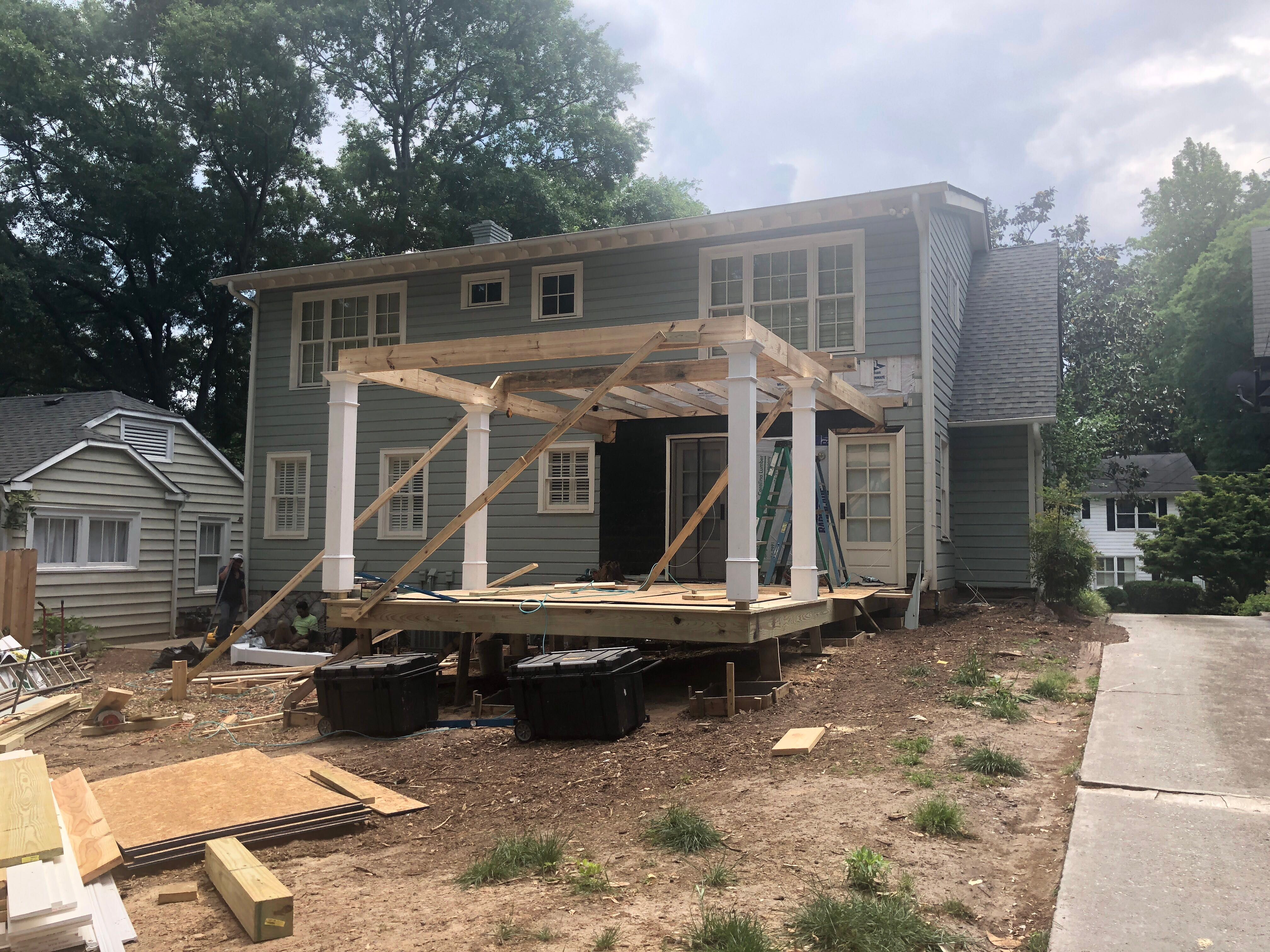 Atlanta Screen Porch Addition Featuring White Brick Outdoor Fireplace by Swift Home Renovations