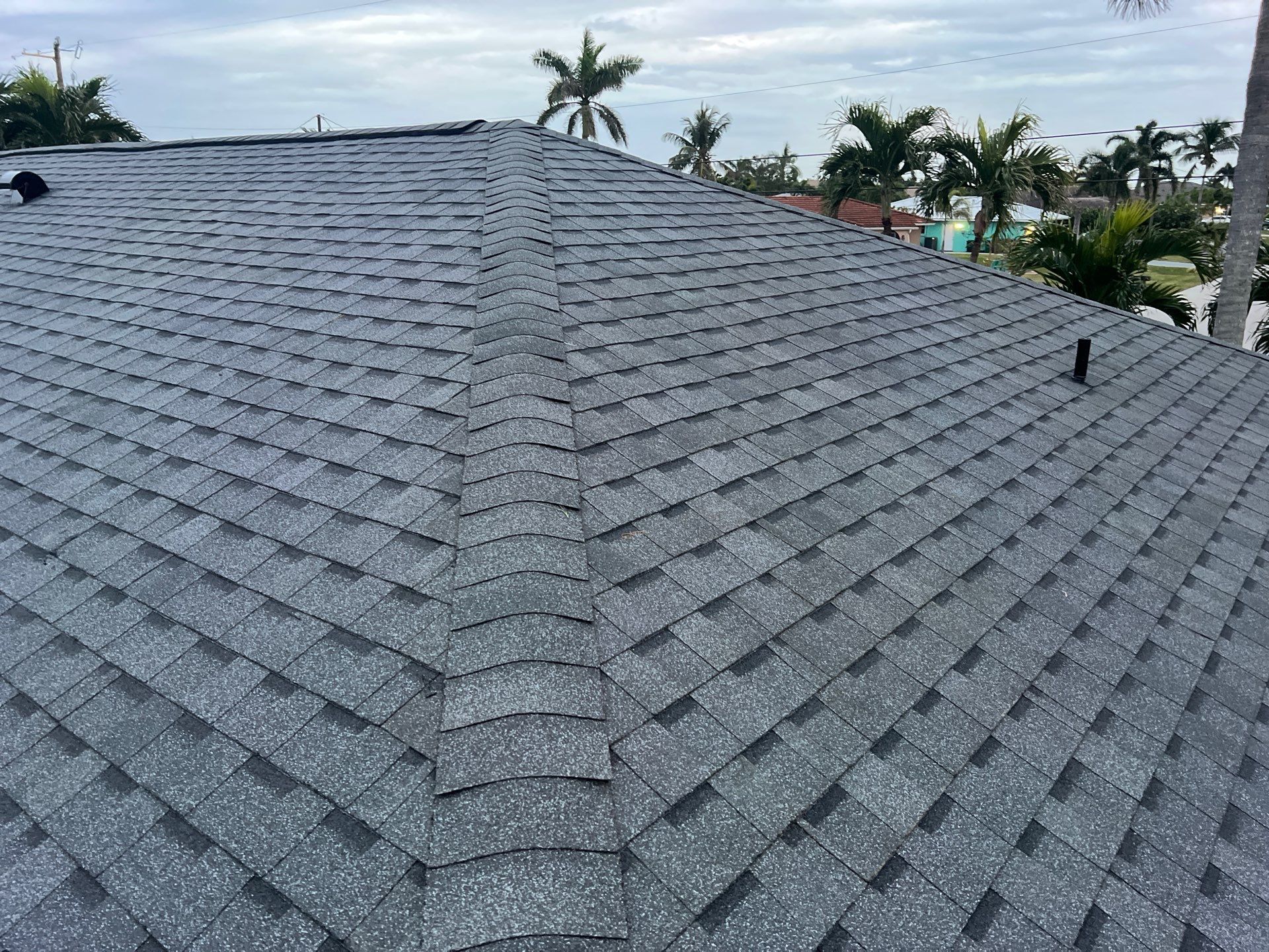 Residential Roofing Installation using Pinnacle Pristine Shingle in Pewter Gray by Durabilis Roofing INC