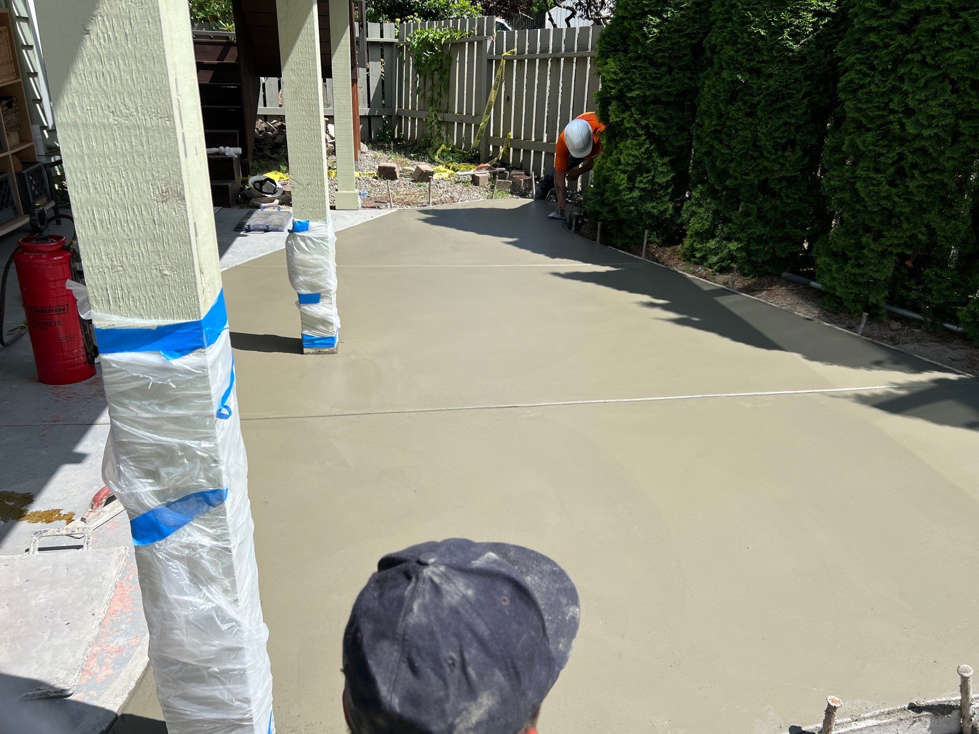 Ashley | Concrete Back Patio by Jireh Asphalt & Concrete Inc 