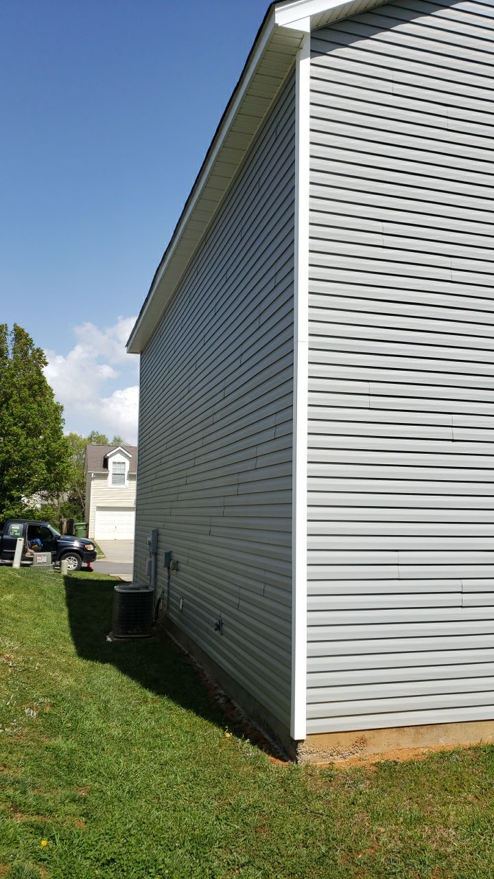 House Wash using cleaner by Power Wash Masters LLC