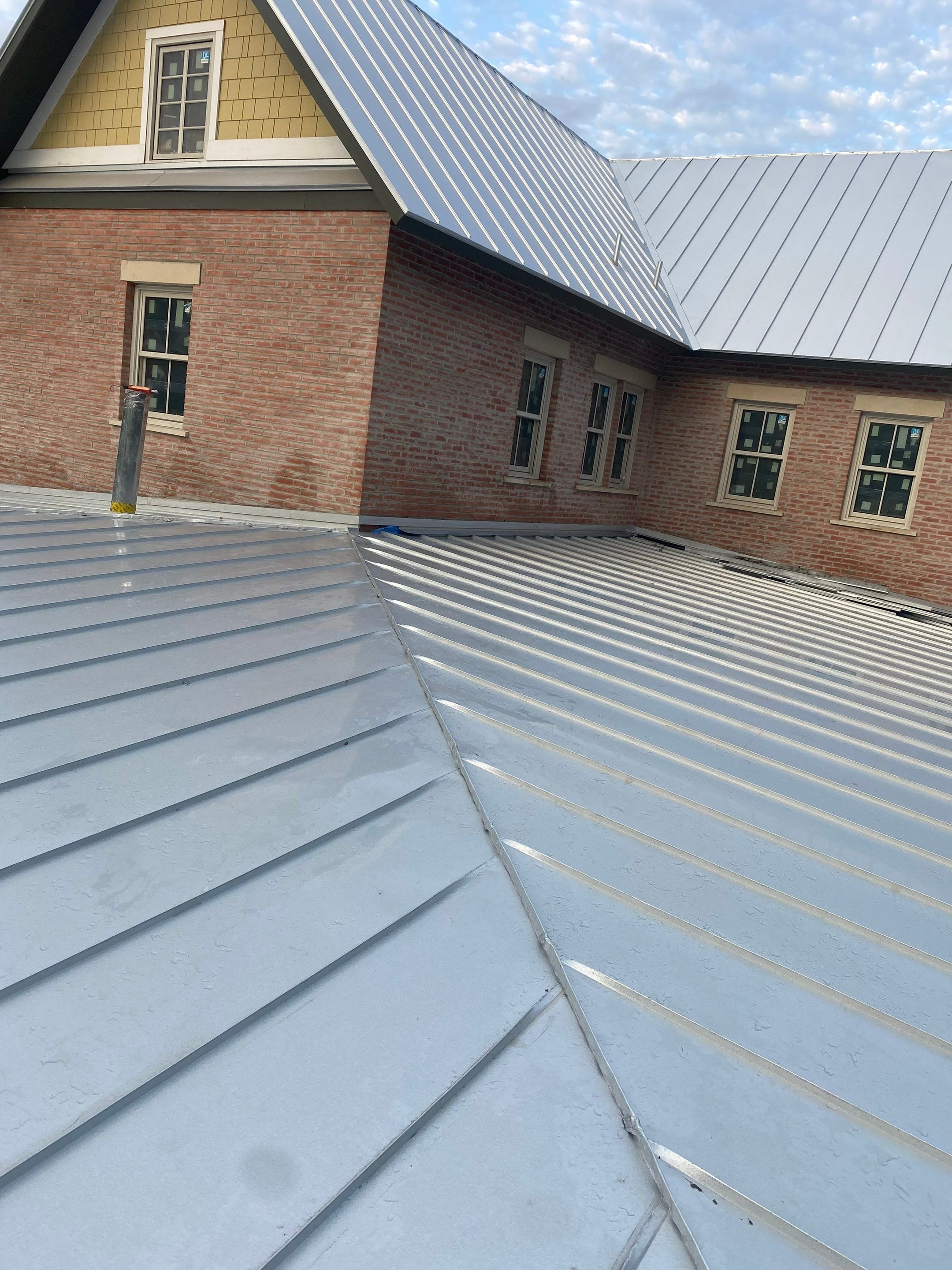 Residential Metal Roof Installation using McElroy Metal by Premier Roofing and Contracting