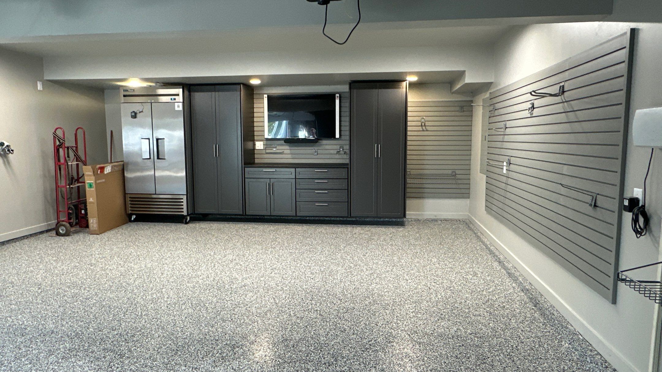 David M. took his garage up a notch with Brand new cabinets and an amazing floor by Banner Garage