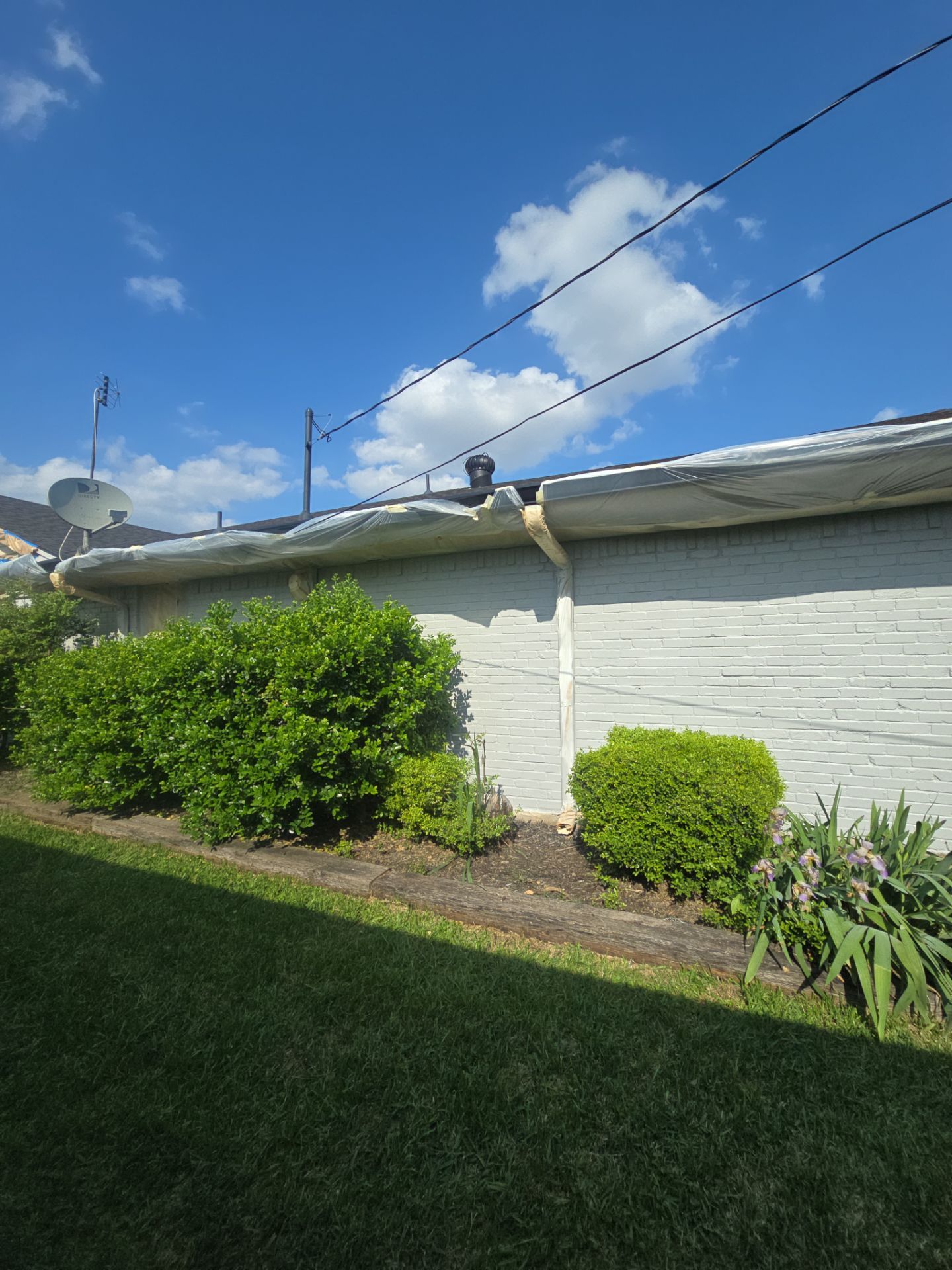 Exterior Home Paint Project with Different Surfaces by SLM General Contractors & Roofing