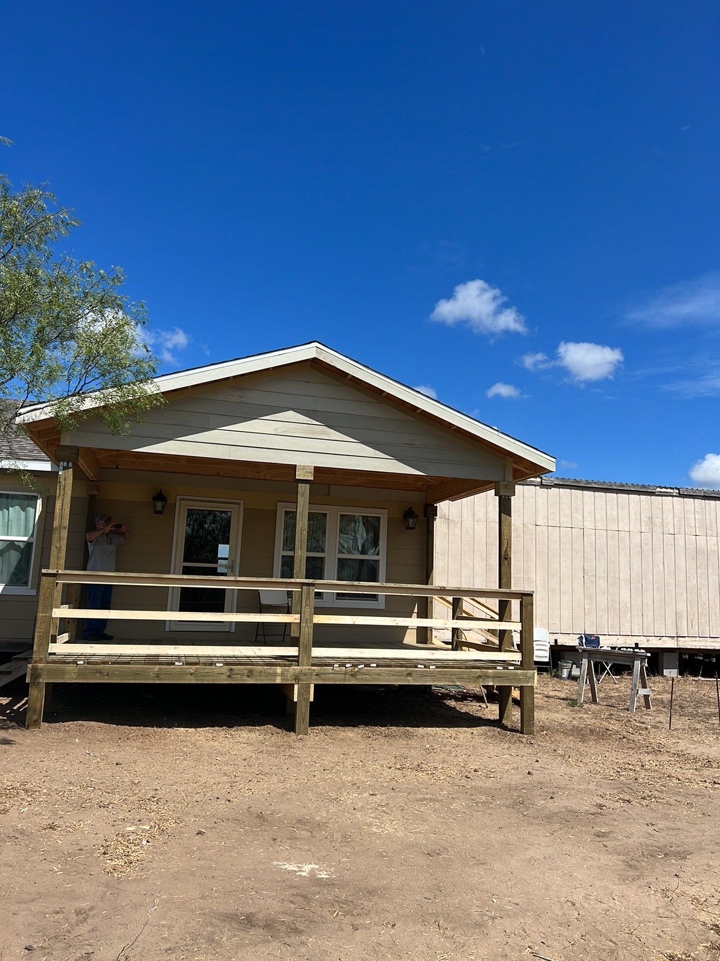 Front Porch Sitt'n by Bayfront Roofing and Construction