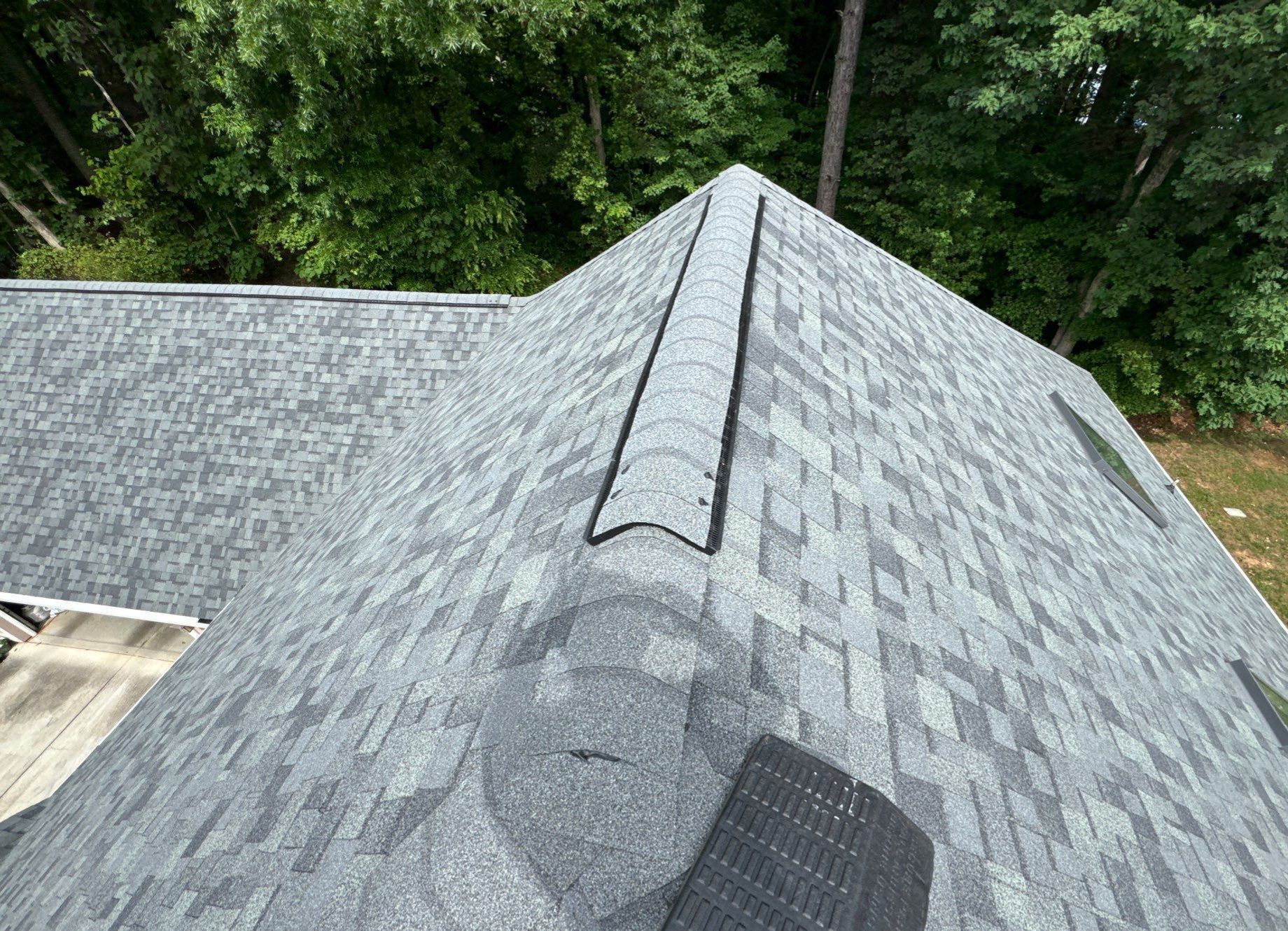 Residential Roof Replacement with Owens Corning Duration Architectural Shingles and 5 Velux Skylights in Charlotte, North Carolina by Merritt Roofing LLC