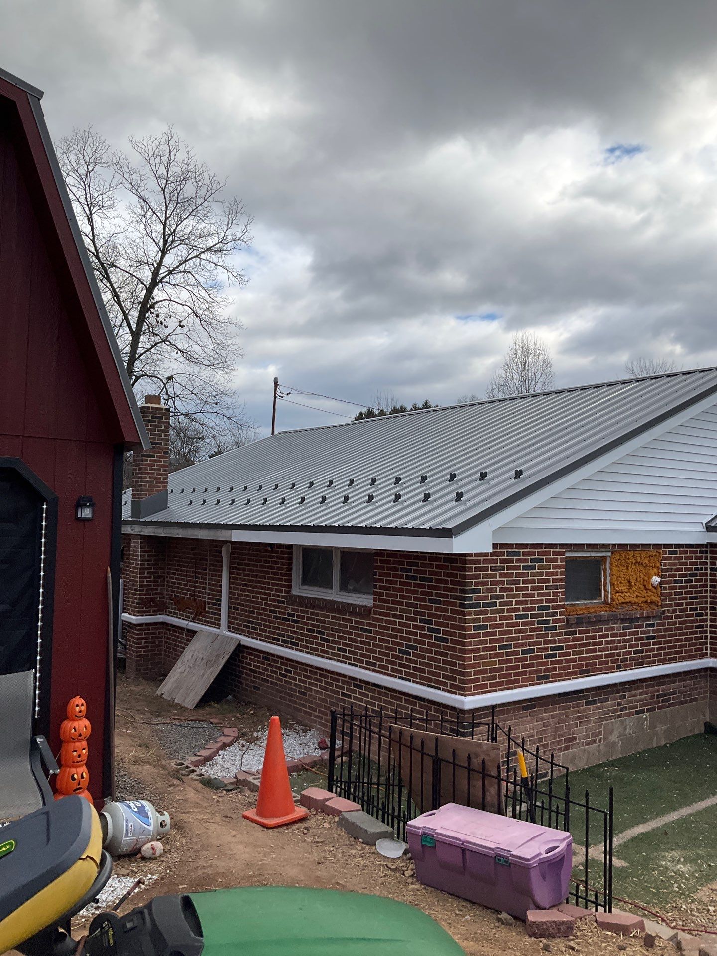 Metal Roofing Replacement and Sunroom Addition in Halifax by Esh Builders