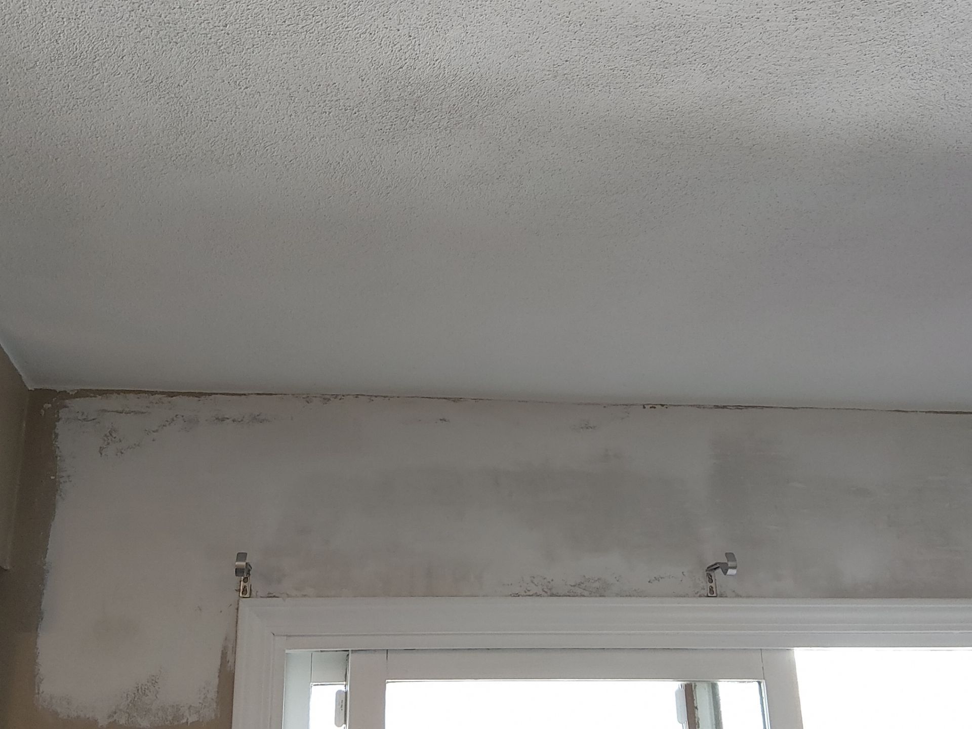 Drywall Repair Above Sliding Door + Seam Repair - Columbia, IL by Legendary Services Company LLC.