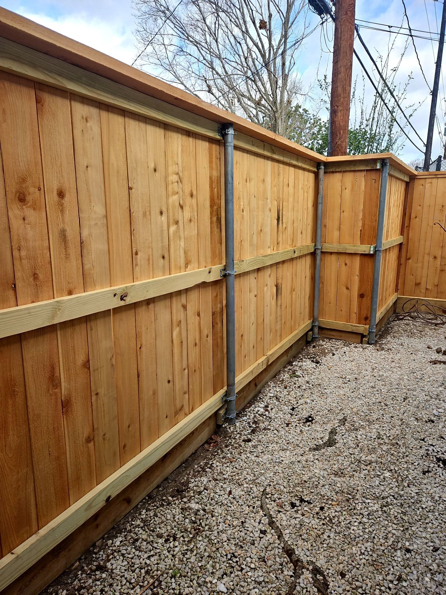 Durable Fence & Gate Installation with Premium Stain by Tim's Fences