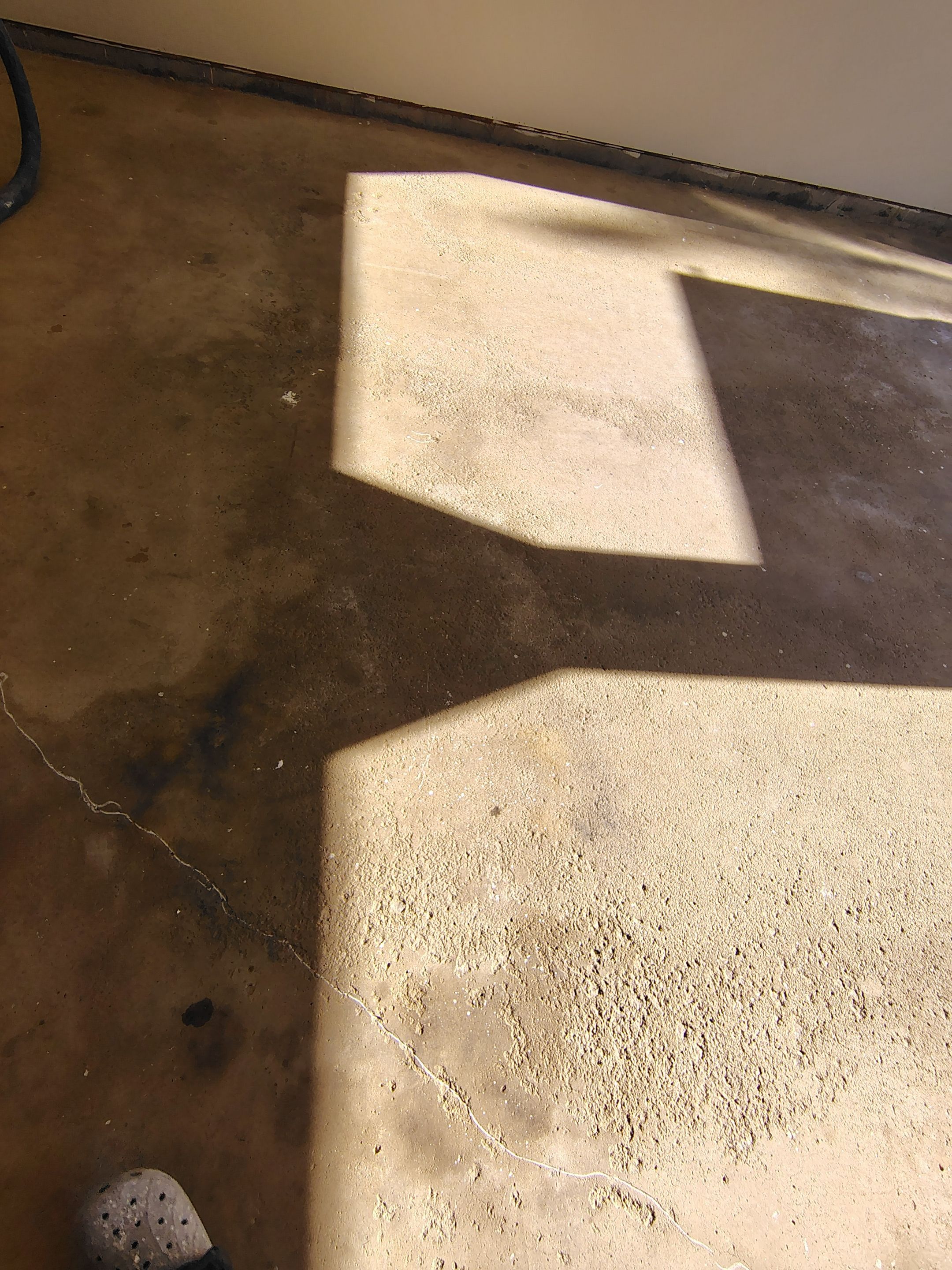 Full-Flake Epoxy Garage Floor Coating Installation in Sioux Falls by Select Painting, Coatings & Garage Cabinets