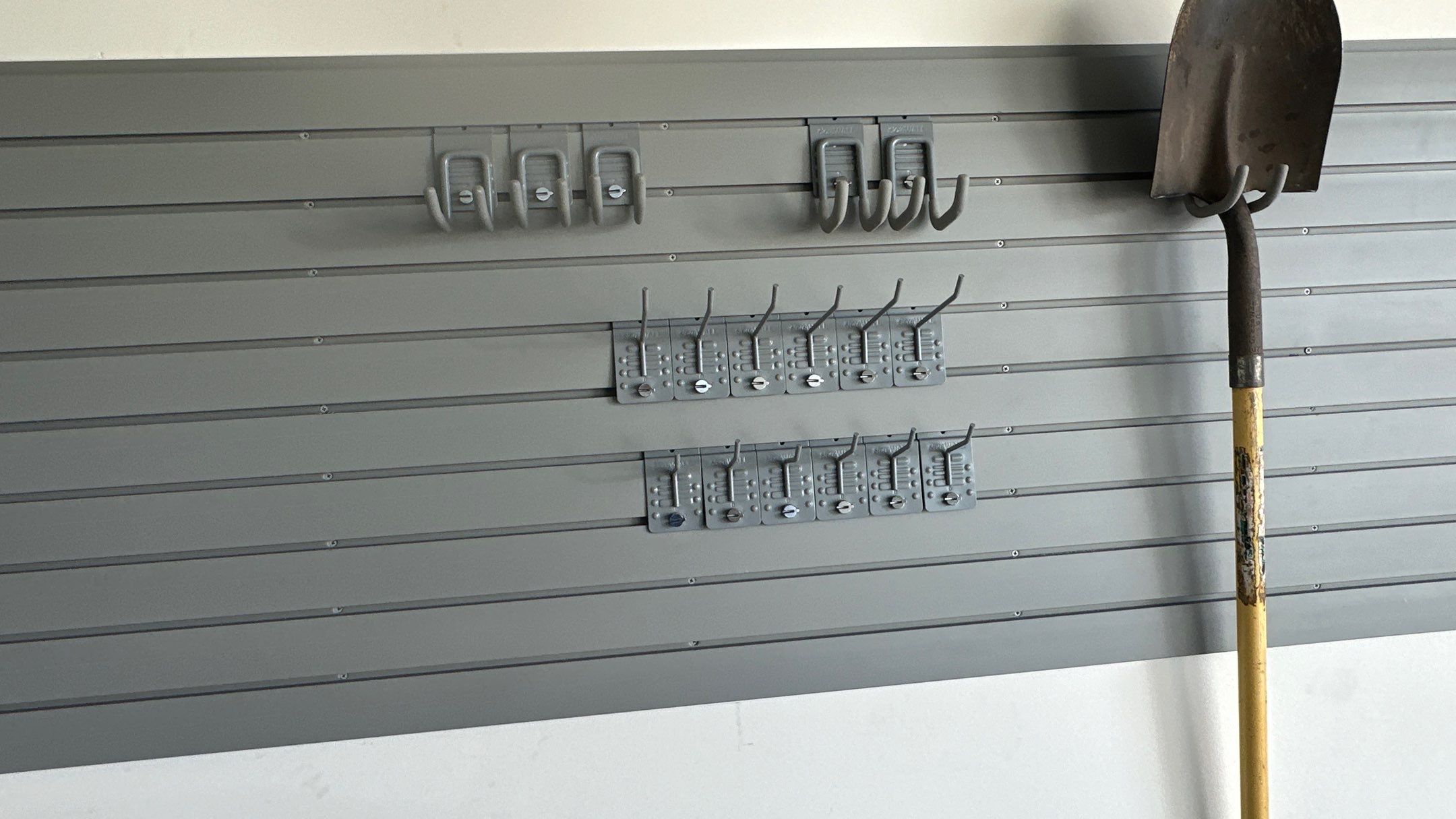 Brad V. had Slotwall and overhead racks added to his garage  by Banner Garage