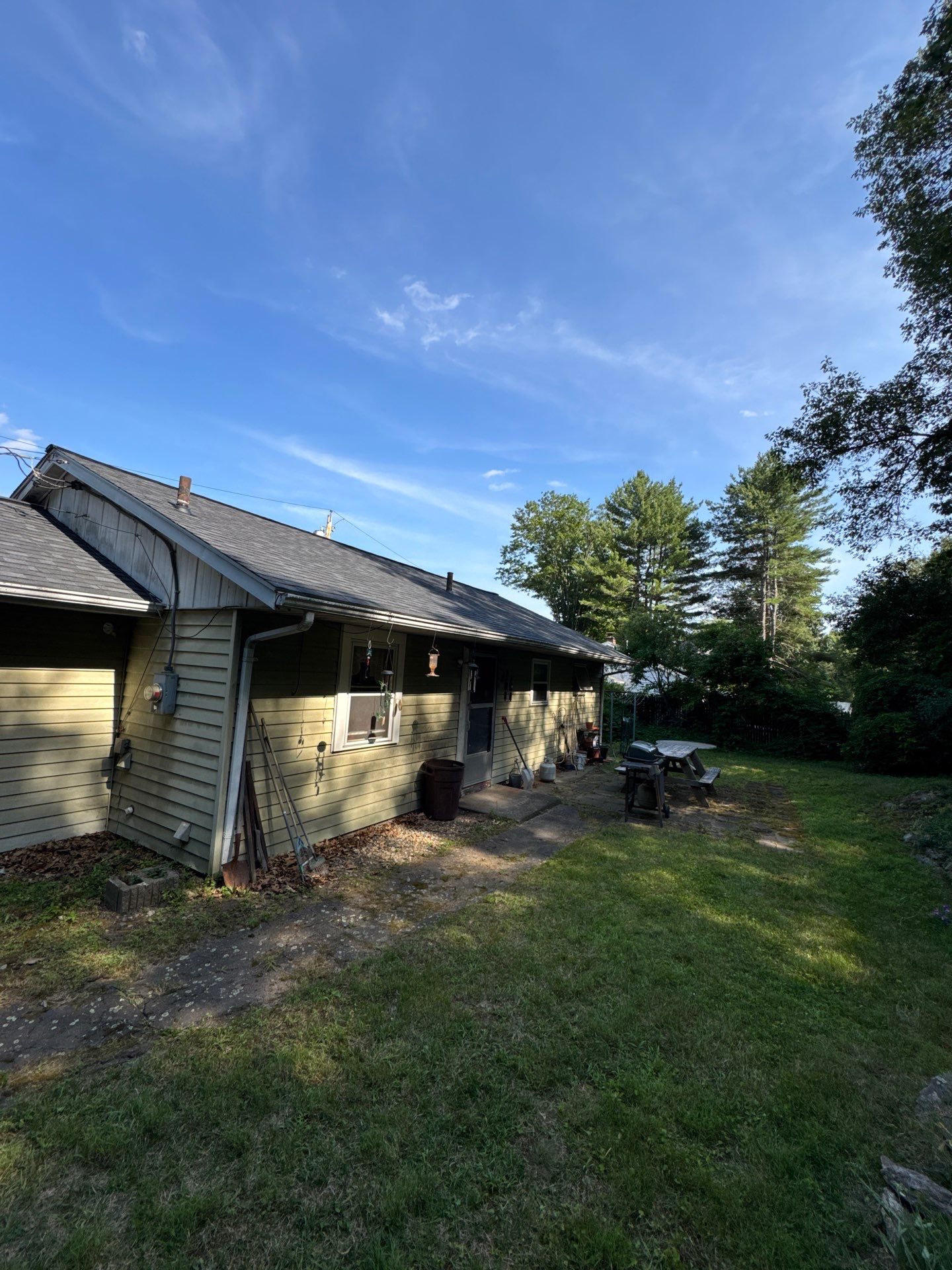 Onyx Black Roof Transformation in Maynard, MA by Mighty Dog Roofing of Greater Middlesex County