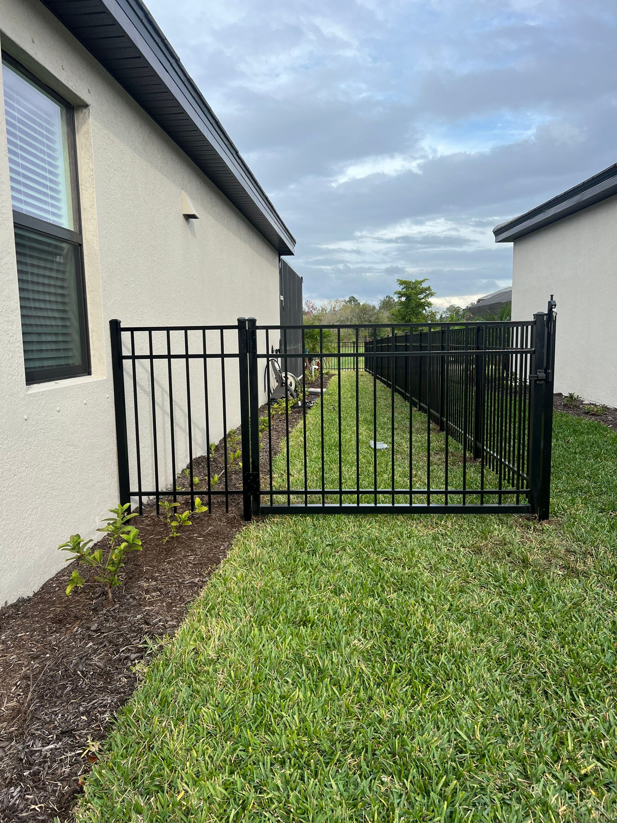 Aluminum Fence Installation using Black 3 Rail Aluminum Fence by Asap fence and gates, LLC