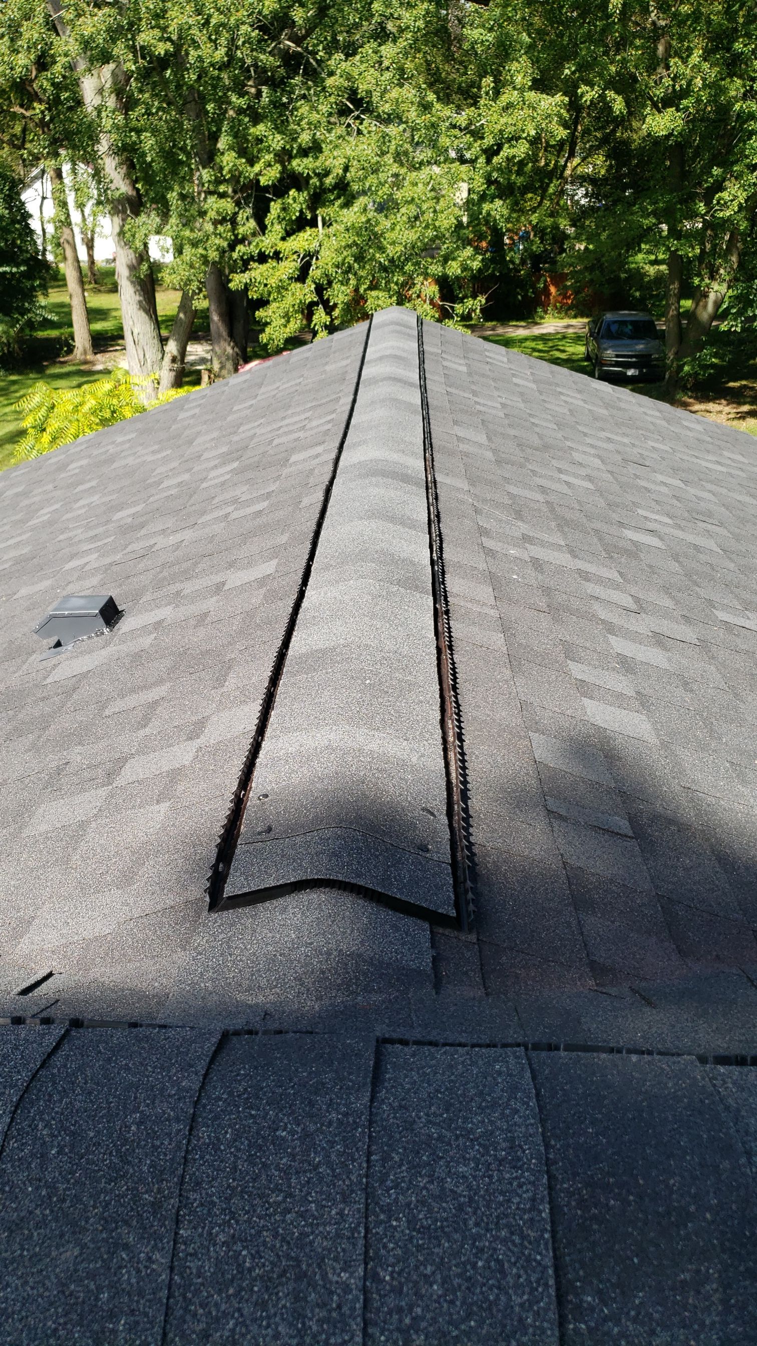 ATLAS PINNACLE COLOR: PRISTINE SCHOTCHGARD BLACK SHADOW DRIP EDGE: BLACK by Eagle Eye Roofing