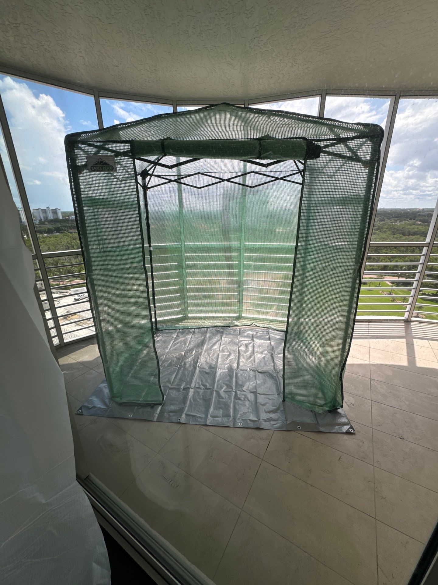 High-Rise Bathroom Remodel by Naples Flooring Boutique