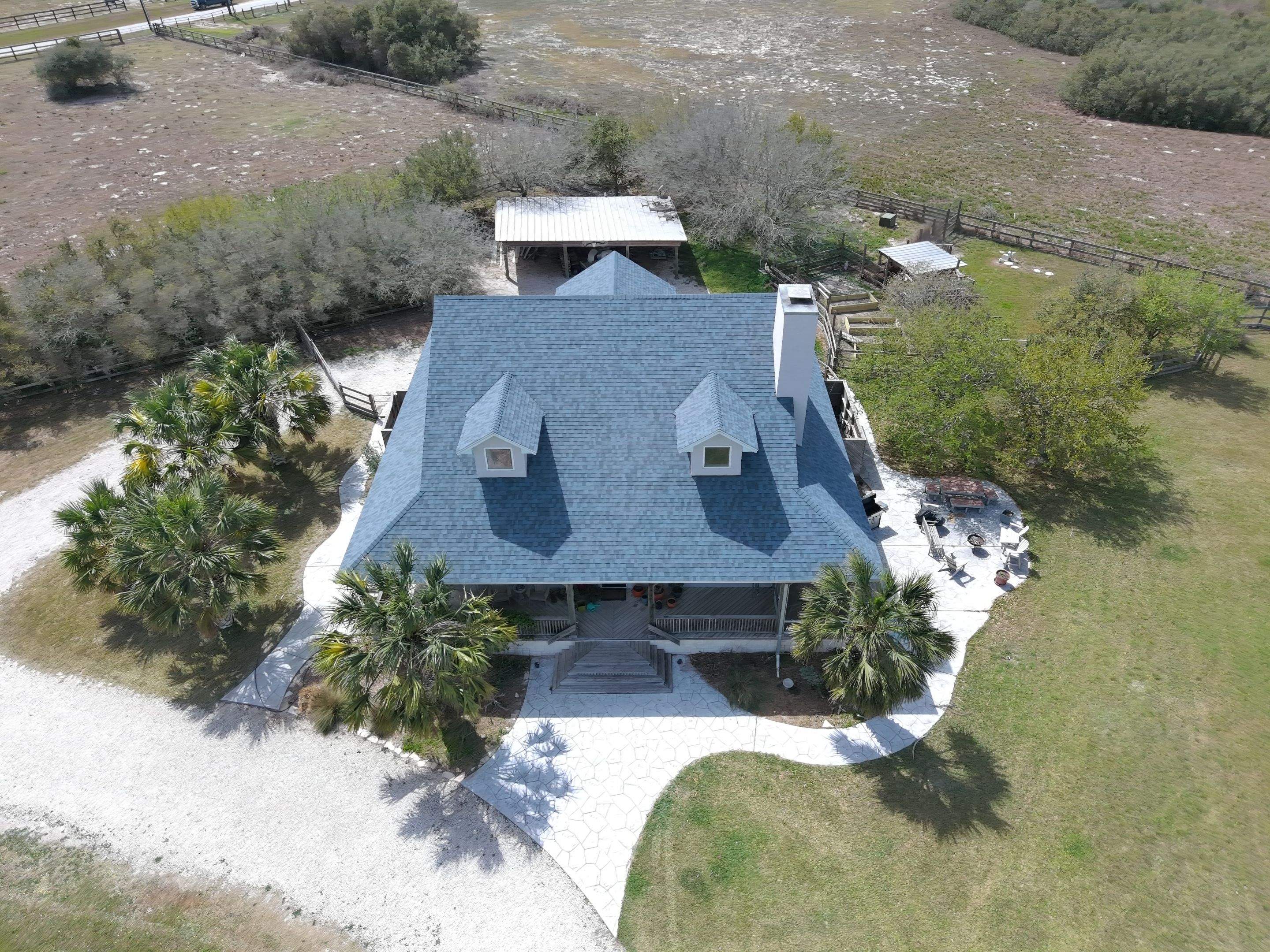 Long Horn Retreat by Bayfront Roofing and Construction