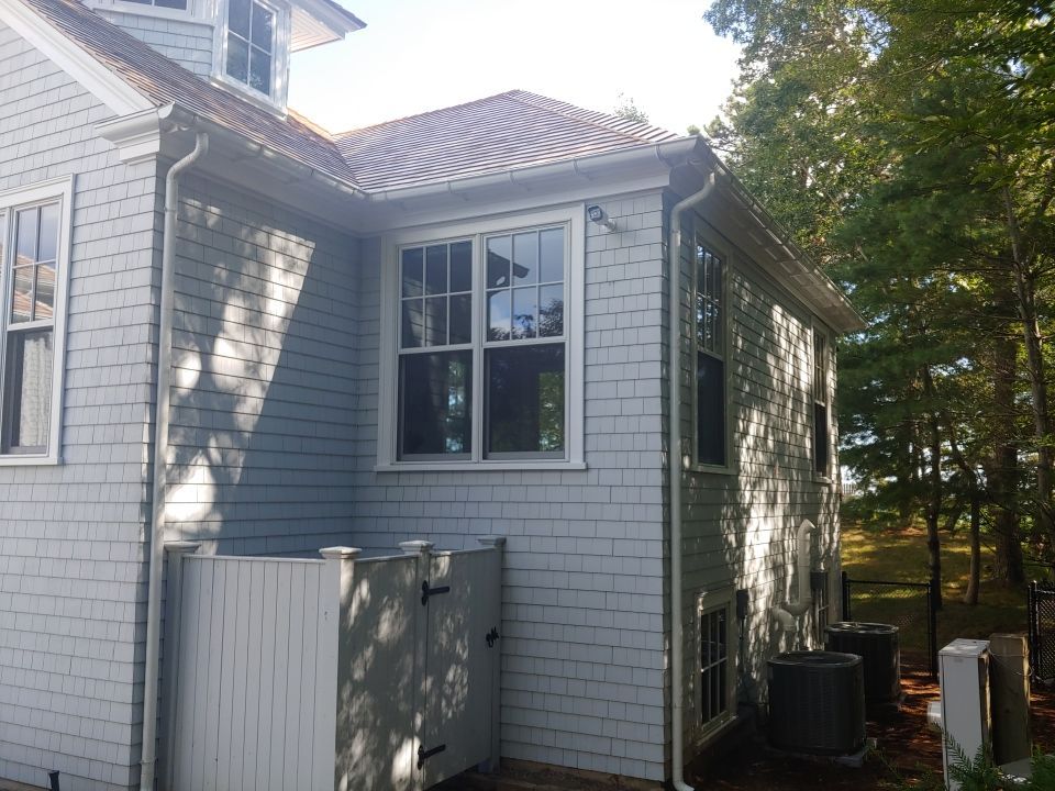 Gutter Installation using 6" Half Round Aluminum Gutter over Crown Moulding by Gutter Pro Enterprises