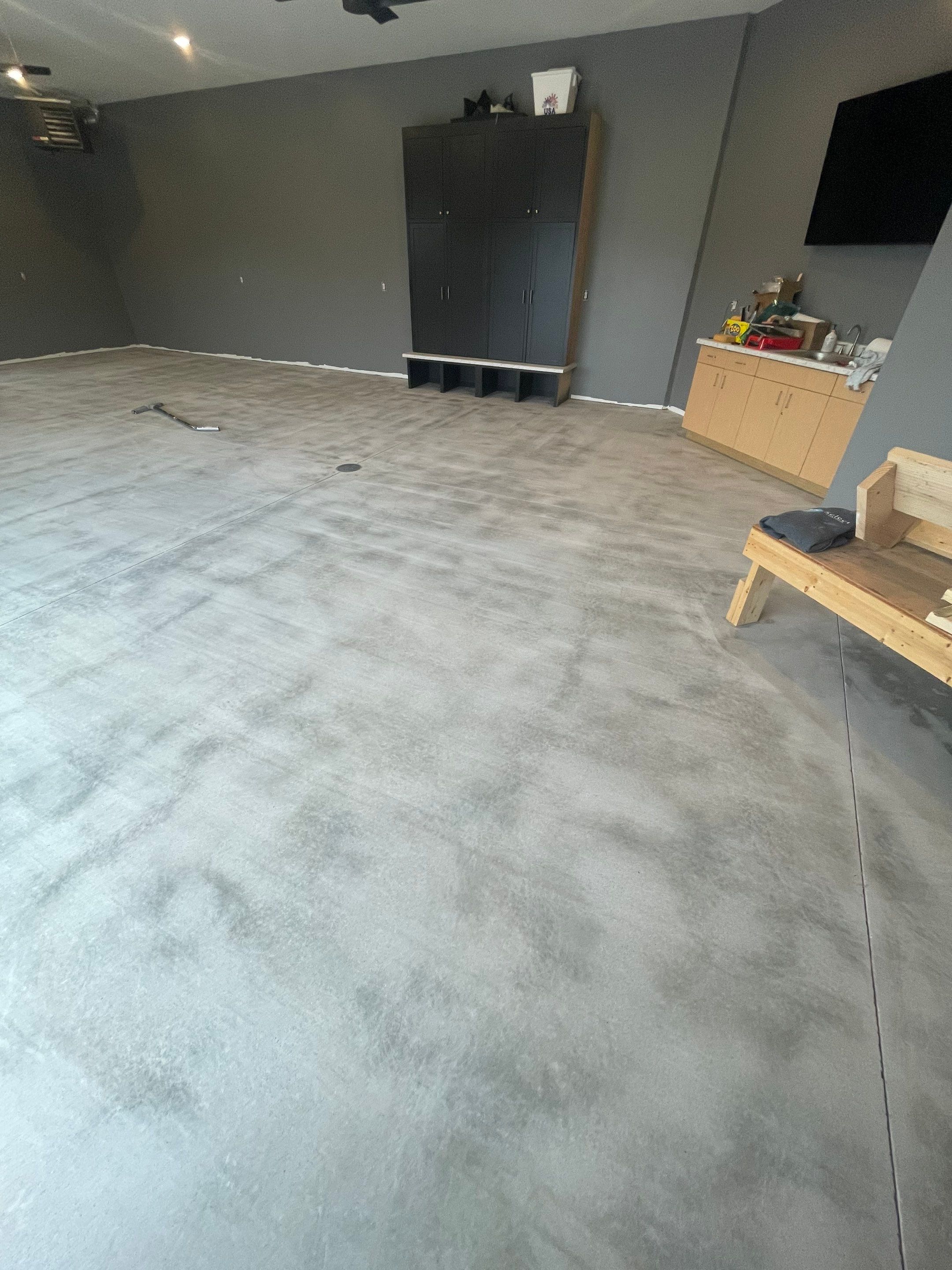 Custom Speckled Concrete Coating for Dell Rapids Garage by Select Painting, Coatings & Garage Cabinets