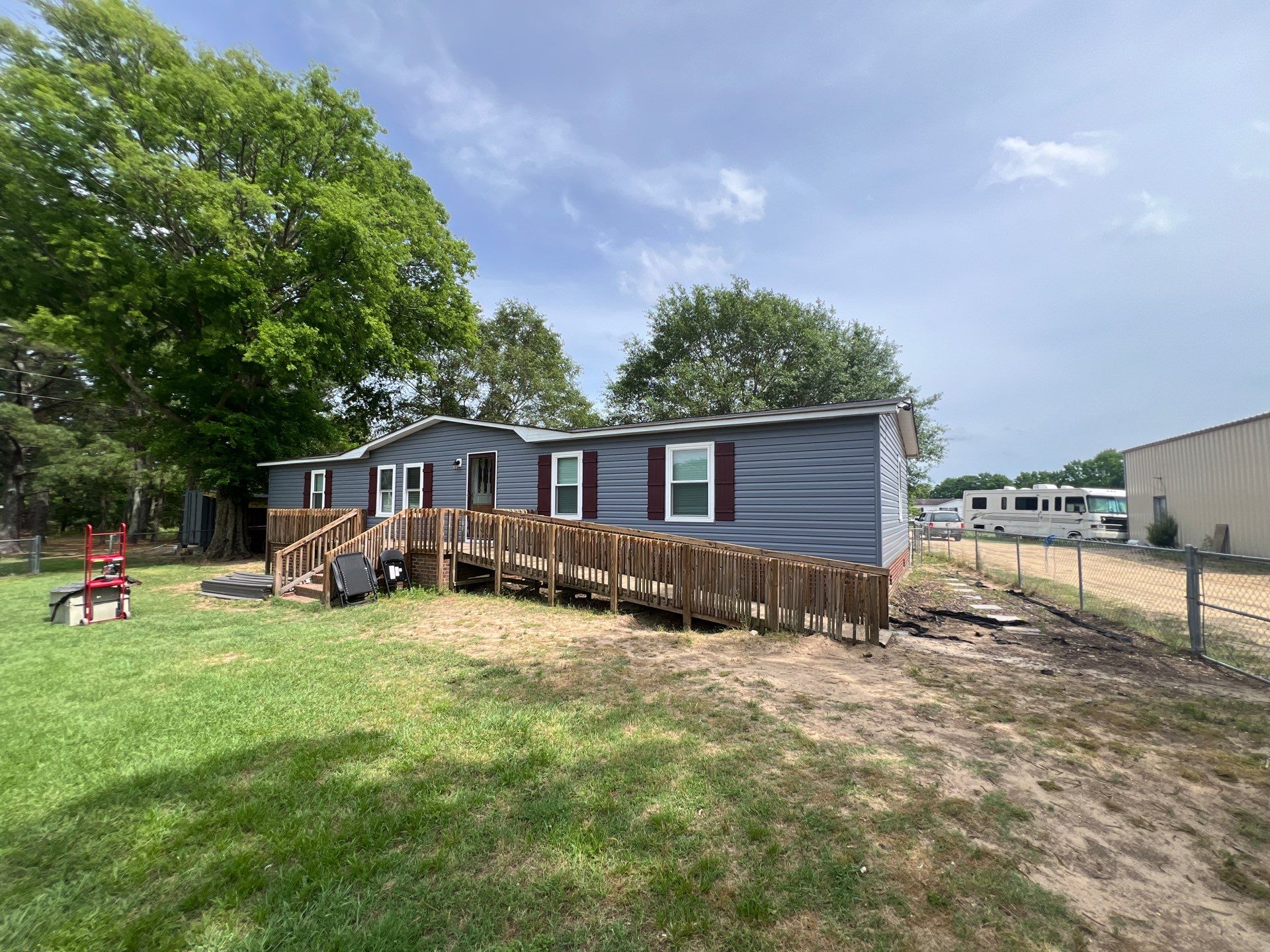 Vinyl Siding and Window Replacement for Goldsboro Modular Home by The Remodeling Company