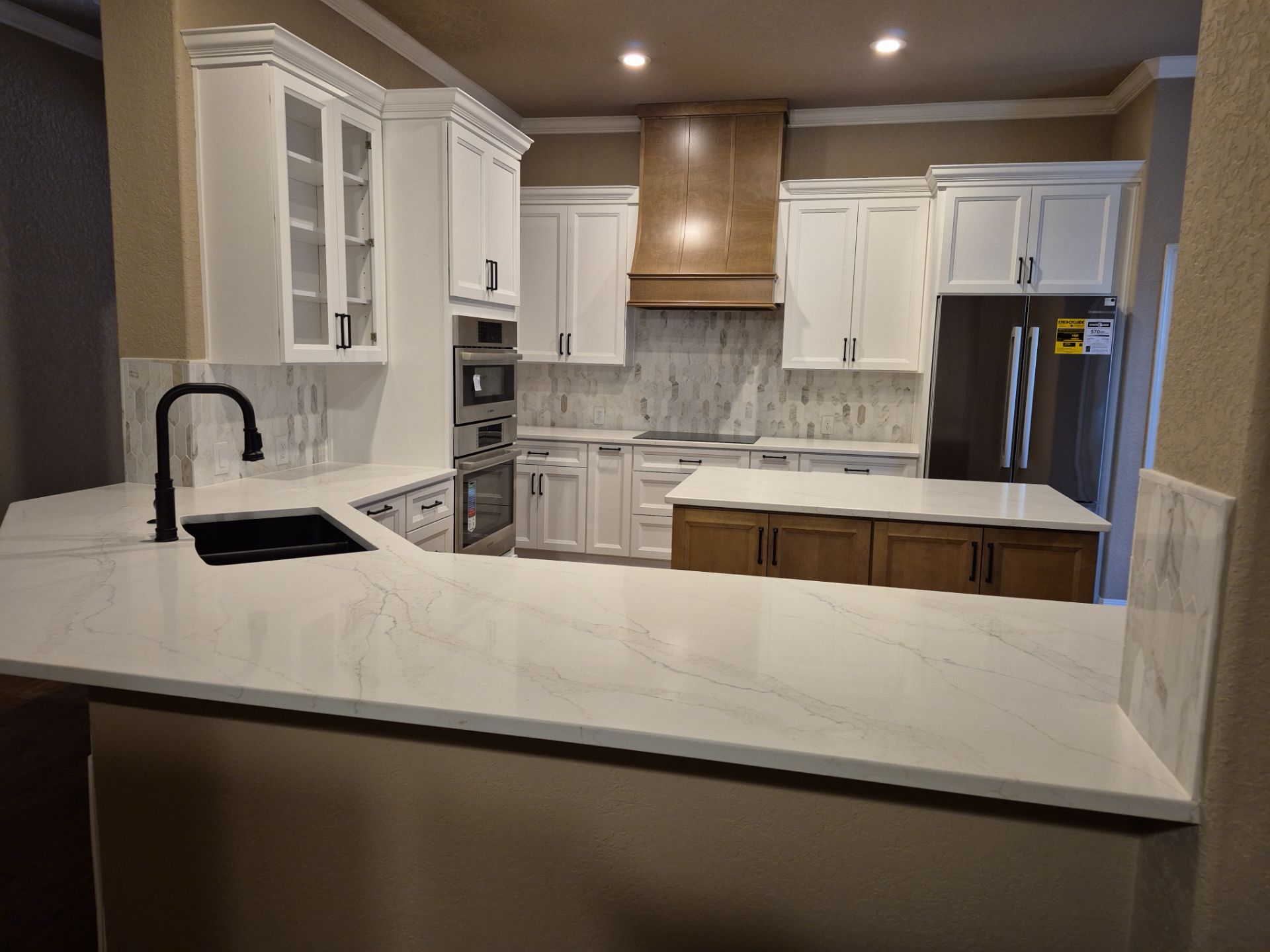 Schertz Kitchen Remodel with Two-Tone Cabinets and Quartz Countertops by Legacy Bath and Kitchen