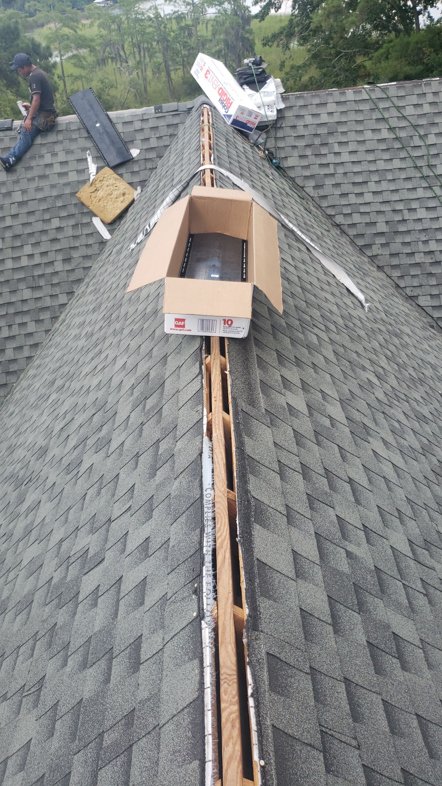 Residential Roofing Installation using Roof Replacement by American Roofing & Construction LLC