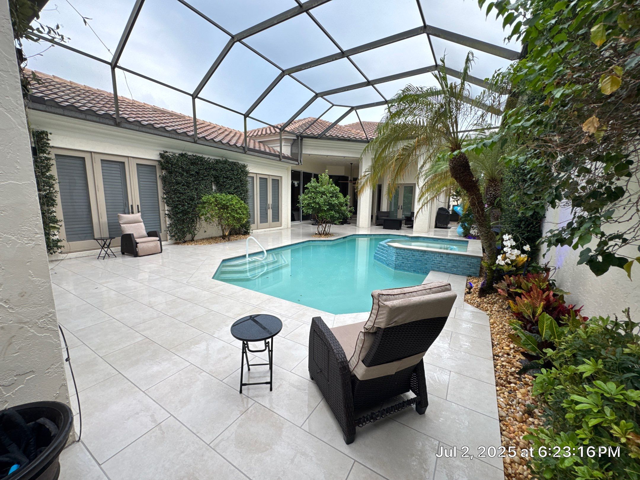 Pool Deck/Landscape/landscape lighting/pool coping/porcelain pavers/Pelican Marsh by Old Town Pavers Llc